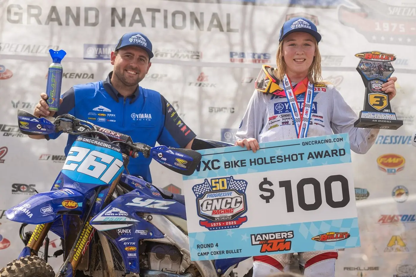 Danielle McDonald with her  mechanic Dylan Bean celebrating her first podium finish in the Grand National Cross Country Series. PHOTOS: AmPro Racing Facebook page (Mack Faint)