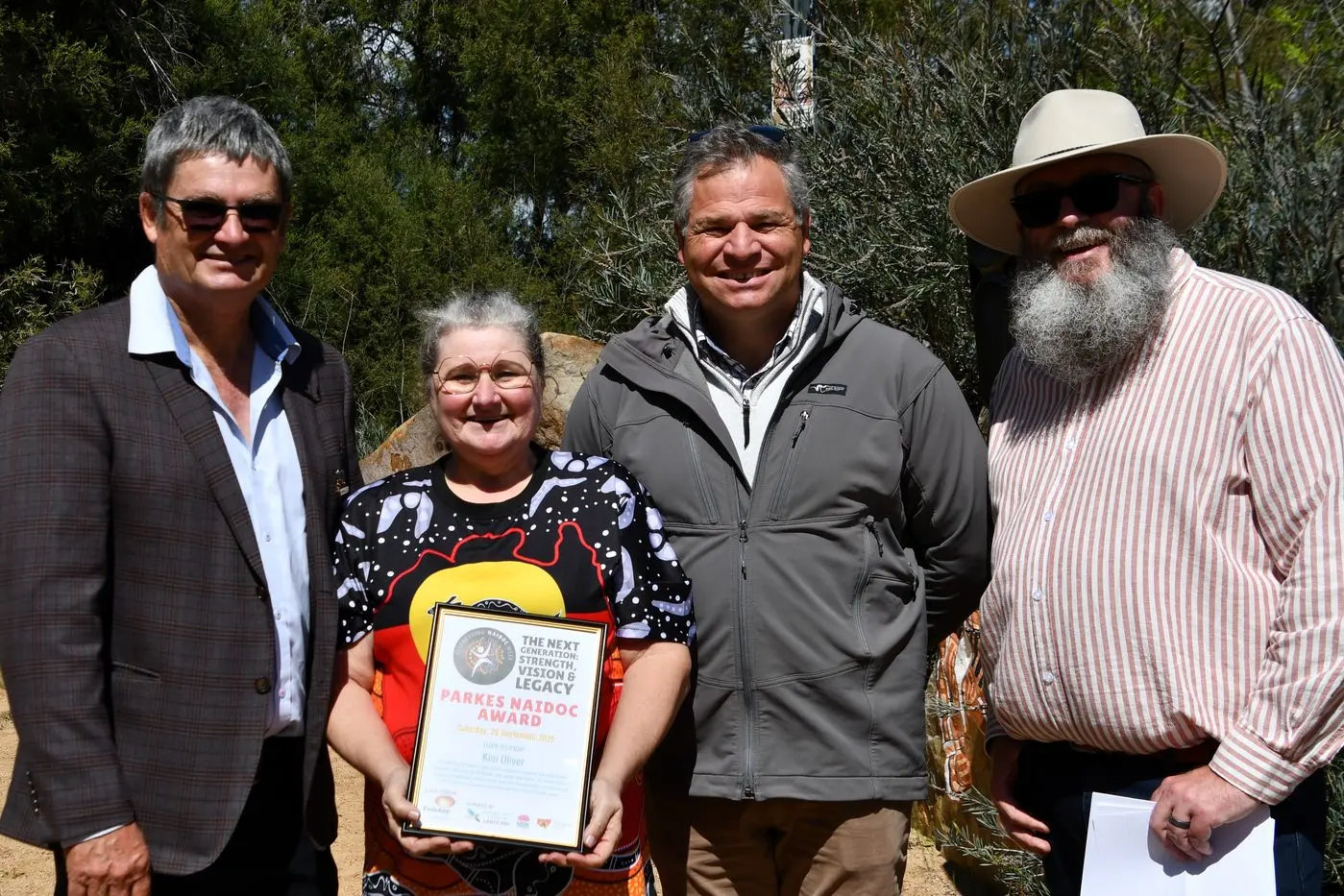 The 2025 Elder award was presented to Kim Oliver, pictured with Parkes Mayor Cr Neil Westcott, Member for Orange Phil Donato and Cr Doug Pout. PHOTOS: Jenny Kingham