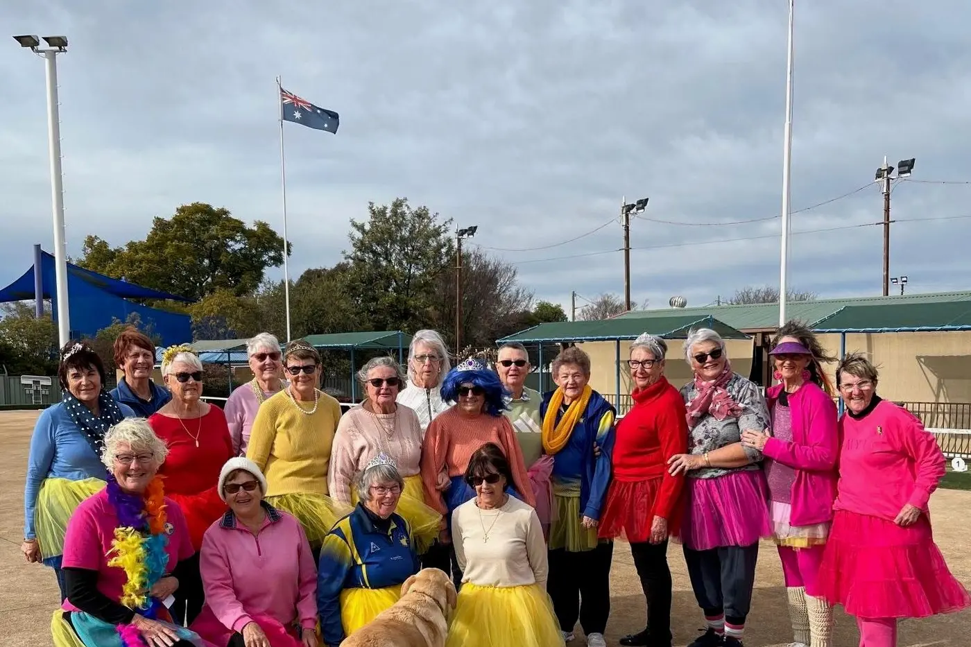 Parkes lady bowlers in their tu-tus for tu-tu Tuesday on the 22 July, with their mascot Buddy who appeared interested in the team\\'s new attire. PHOTO: Supplied