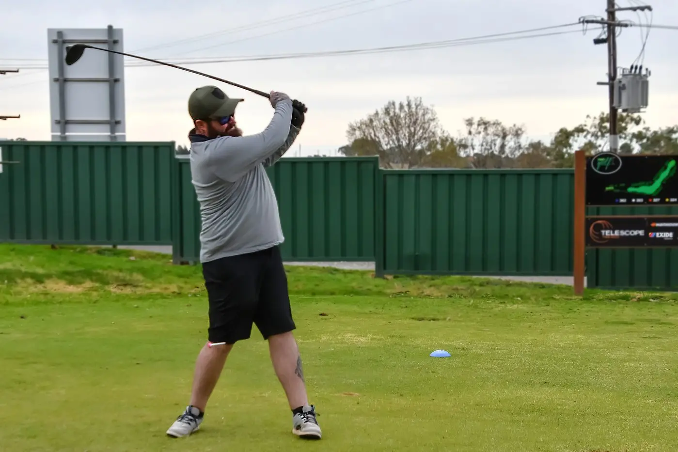 Tyson Spence tees off on the Parkes Gold Course which is getting greener by the day as Spring nears. PHOTO: Jenny Kingham