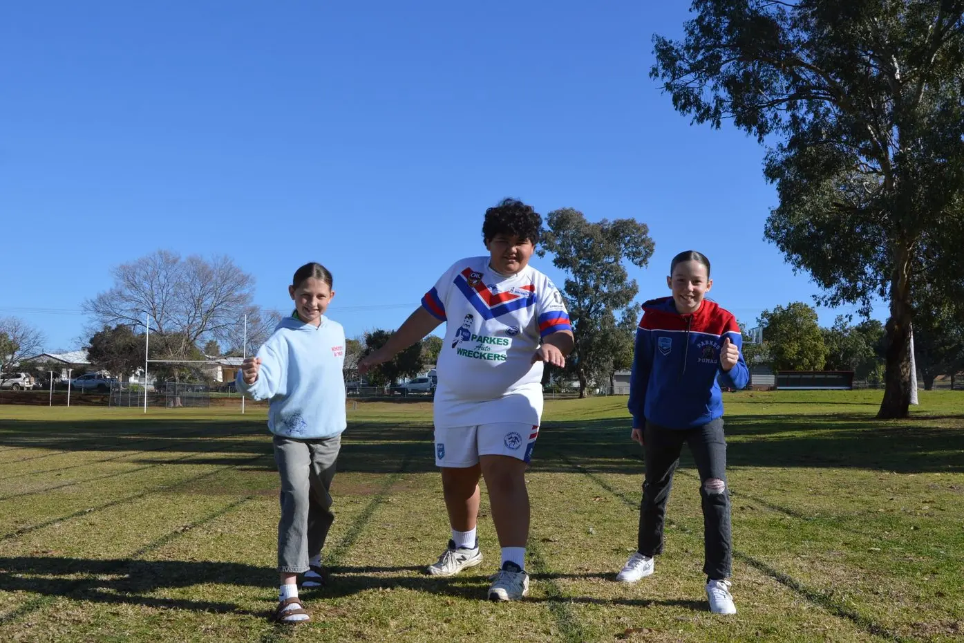 Parkes East Public School athletics carnival record breakers. Priya Kinsela (1500m run), Sol Rauchle (discus) and Sienna Cheney (100m sprint). PHOTO: Madeline Blackstock