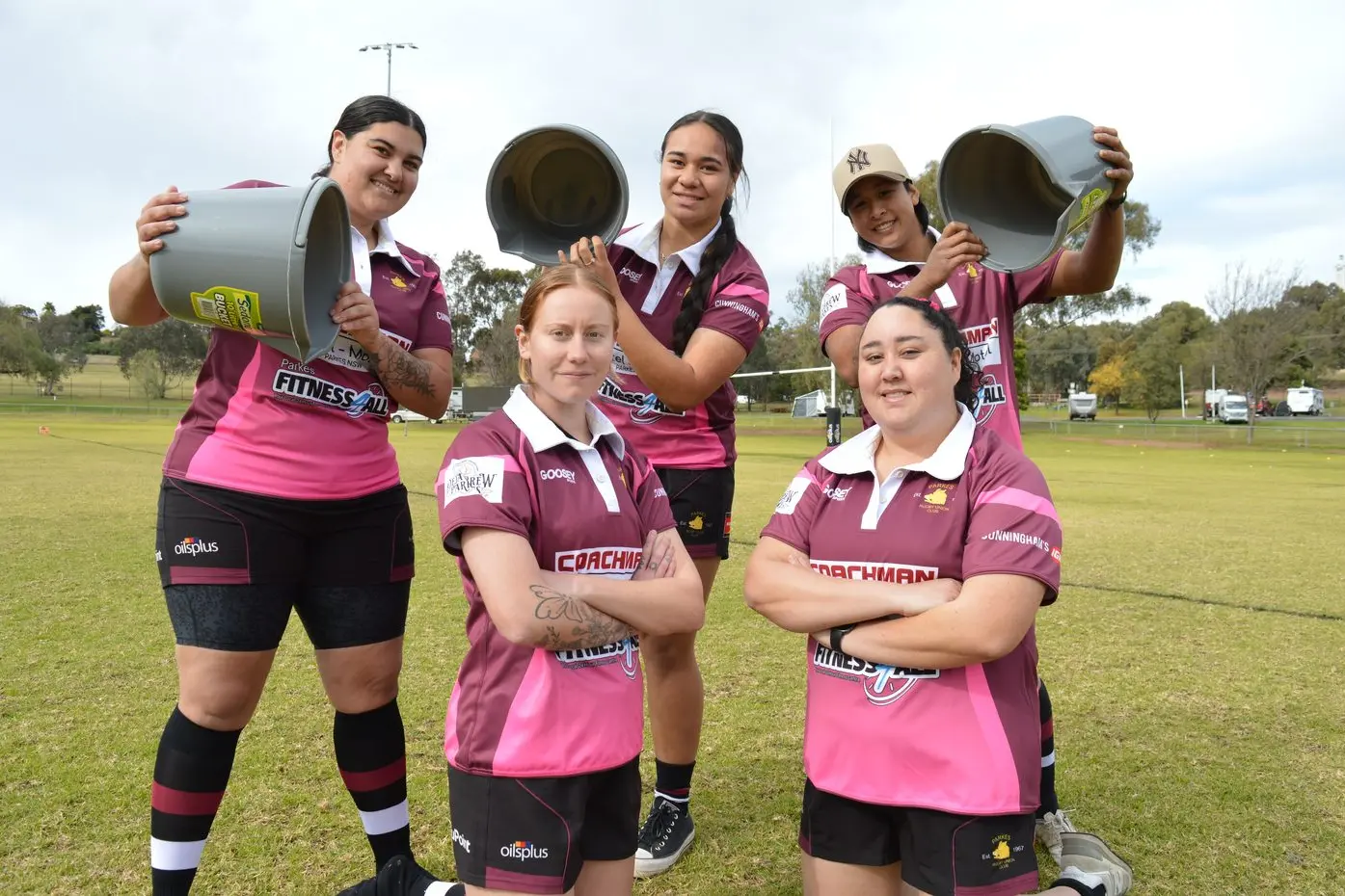 The Parkes Boars are having an an \"epic\" ice bucket fundraiser on 19 July to help send its female players, such as (back) Chloe Smith, Joselyne Folau and Tess Woods, and (front) Britt Ryan and Emma Evans, to New Zealand. PHOTO: Christine Little