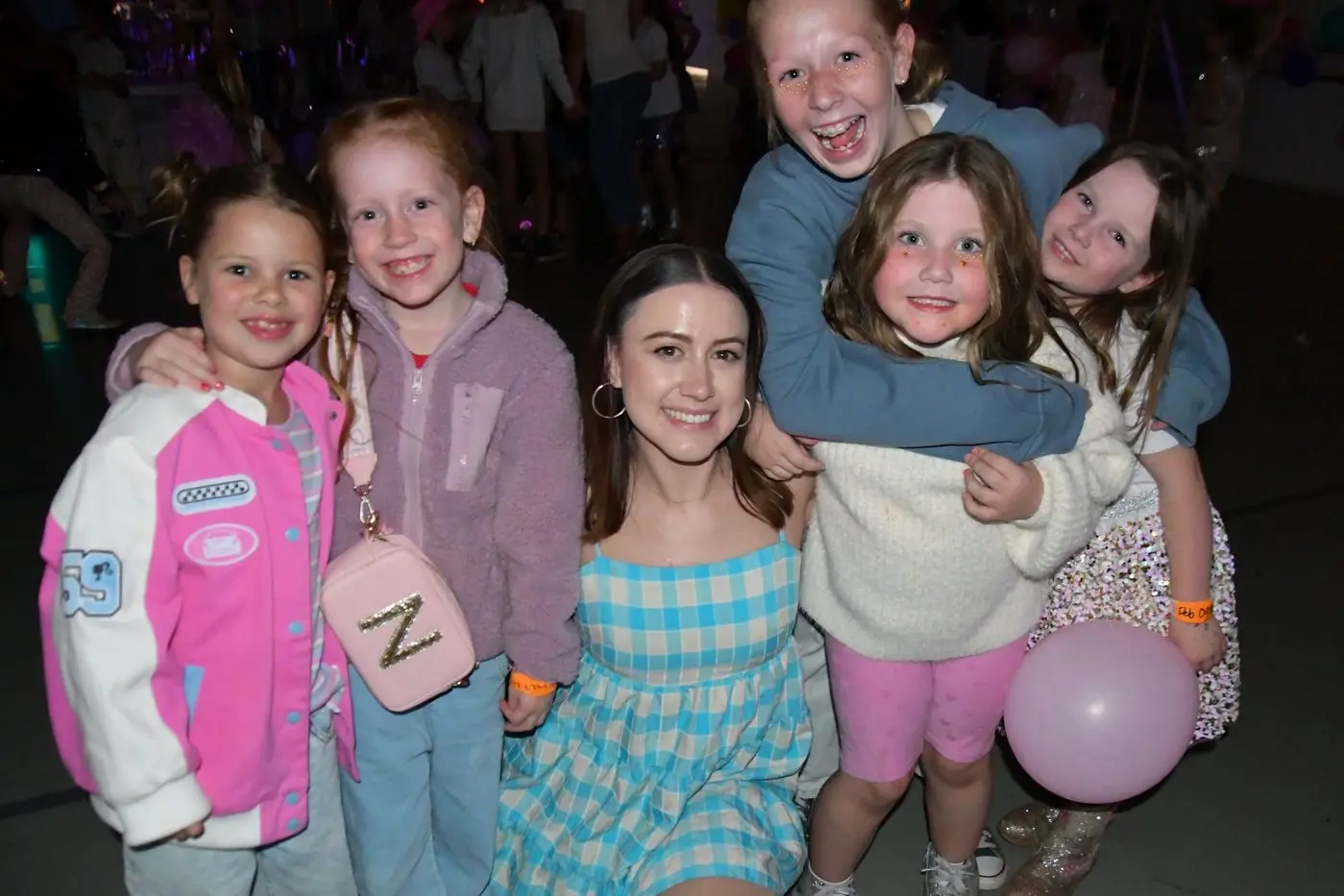 Parkes Dance Co principal Jess Kinsela surrounded by her inspiring students supporting Dance for Sick Kids, raising funds for Ronald McDonald House. PHOTOS: Jenny Kingham
