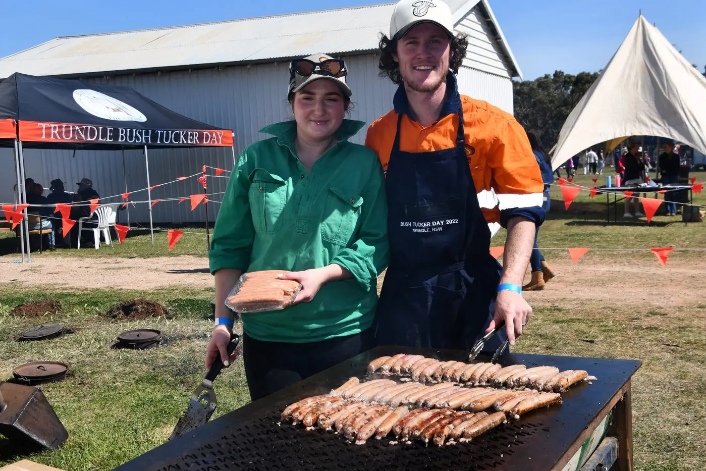 Abbey and Lachlan Westcott cooked Venison and Camel Sausages for the Evolution Mining Free Tasting stand. PHOTOS: Jenny Kingham