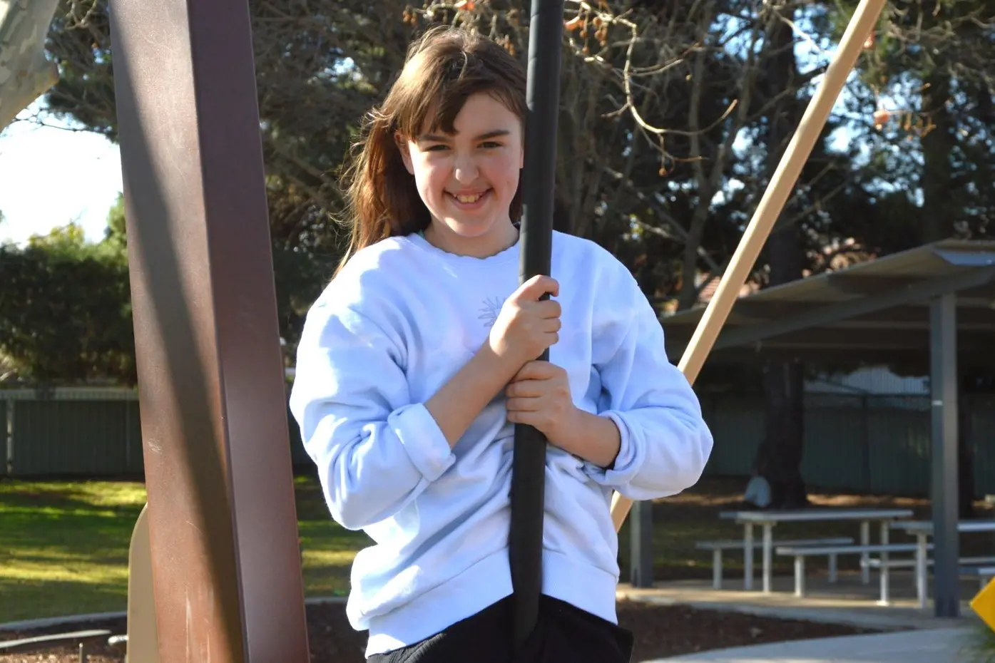 Chloe Thomas now 10 years old enjoys the flying fox at Lions Park and is full of life.