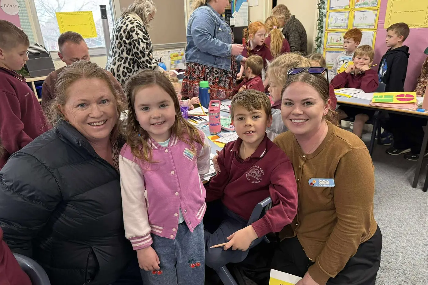 Lto R: Jaxon Lynch proudly showing off his work to his Grandmother Jenine Sloane, sister Ruby and ex-PEPS student Mother Sasha McGrath