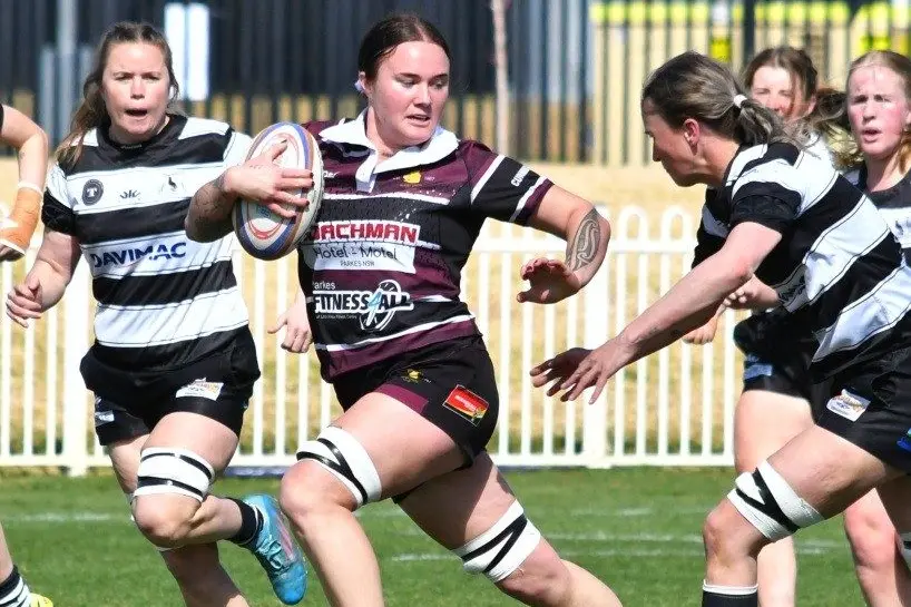 Centre Madi Barclay George claimed a hat trick in the Boars\\' preliminary final against the Molong Magpies, contributing to  their convincing 55-5 victory. PHOTOS: Allan Ryan