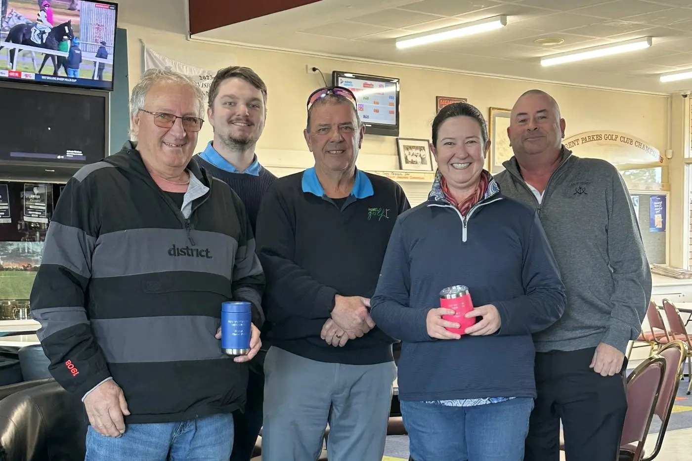 Nick Strudwick, Mick Smith and John Green with men\\'s winner Murray Jackson and ladies\\' winner Mel Matthews. PHOTO: Parkes Golf Club