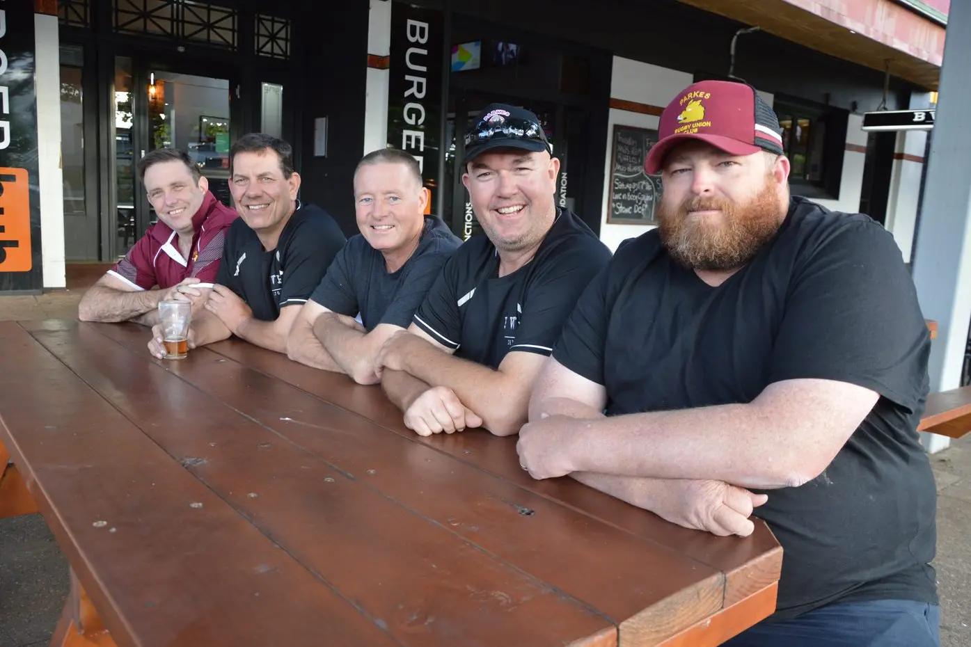 Scott Morrissey, Wayne Osborne, Craig Rusten, Richard Rice and Chris Summerhayes from the Parkes Rugby Union Club without the star-studded Elvis jumpsuits and wigs that made them famous. Picture by Christine Little