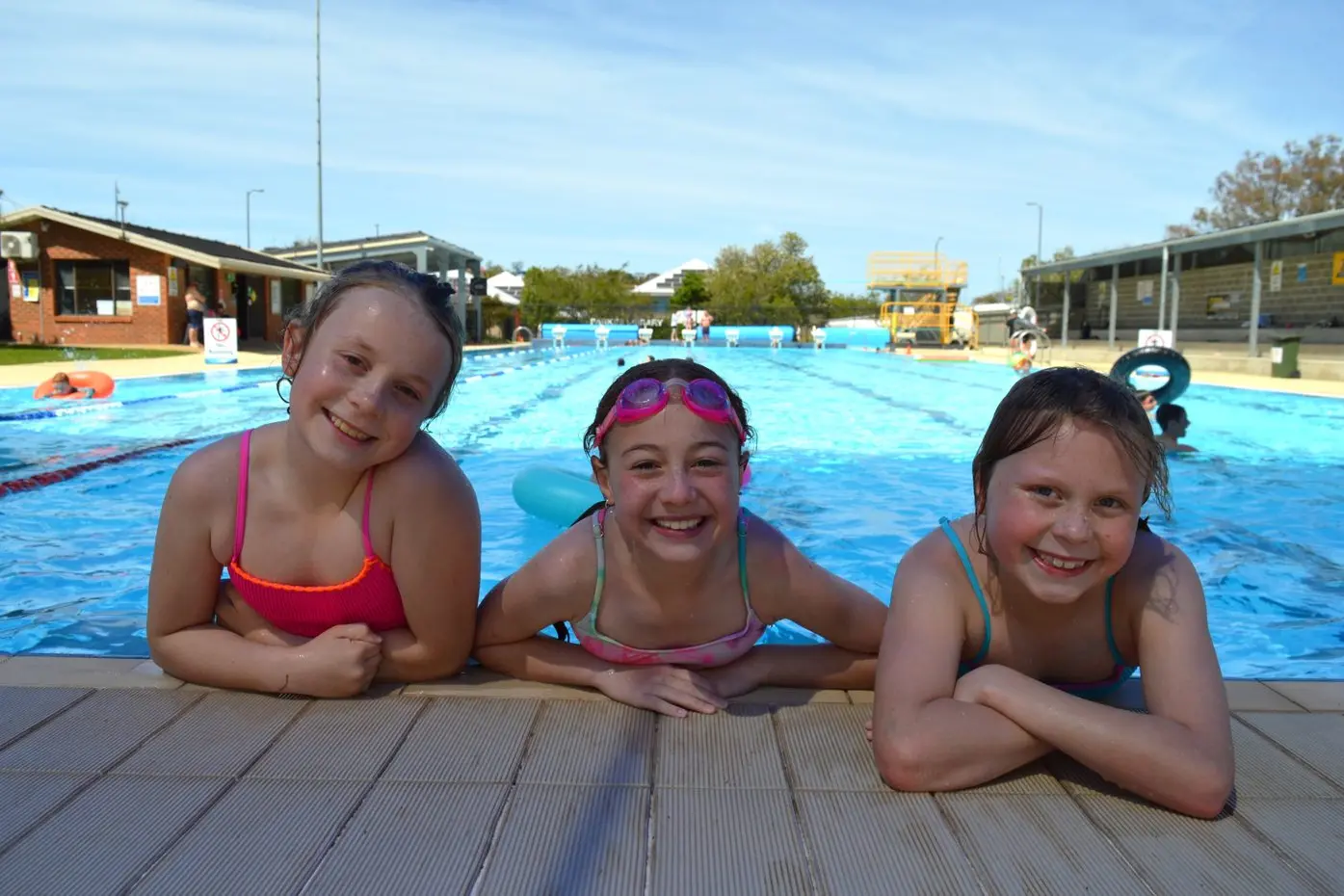 Madi Britt (10), Summah Taylor (9) and Laci Britt (8) cooled off at the Parkes Pool on a warm long weekend Sunday. PHOTOS: Christine Little