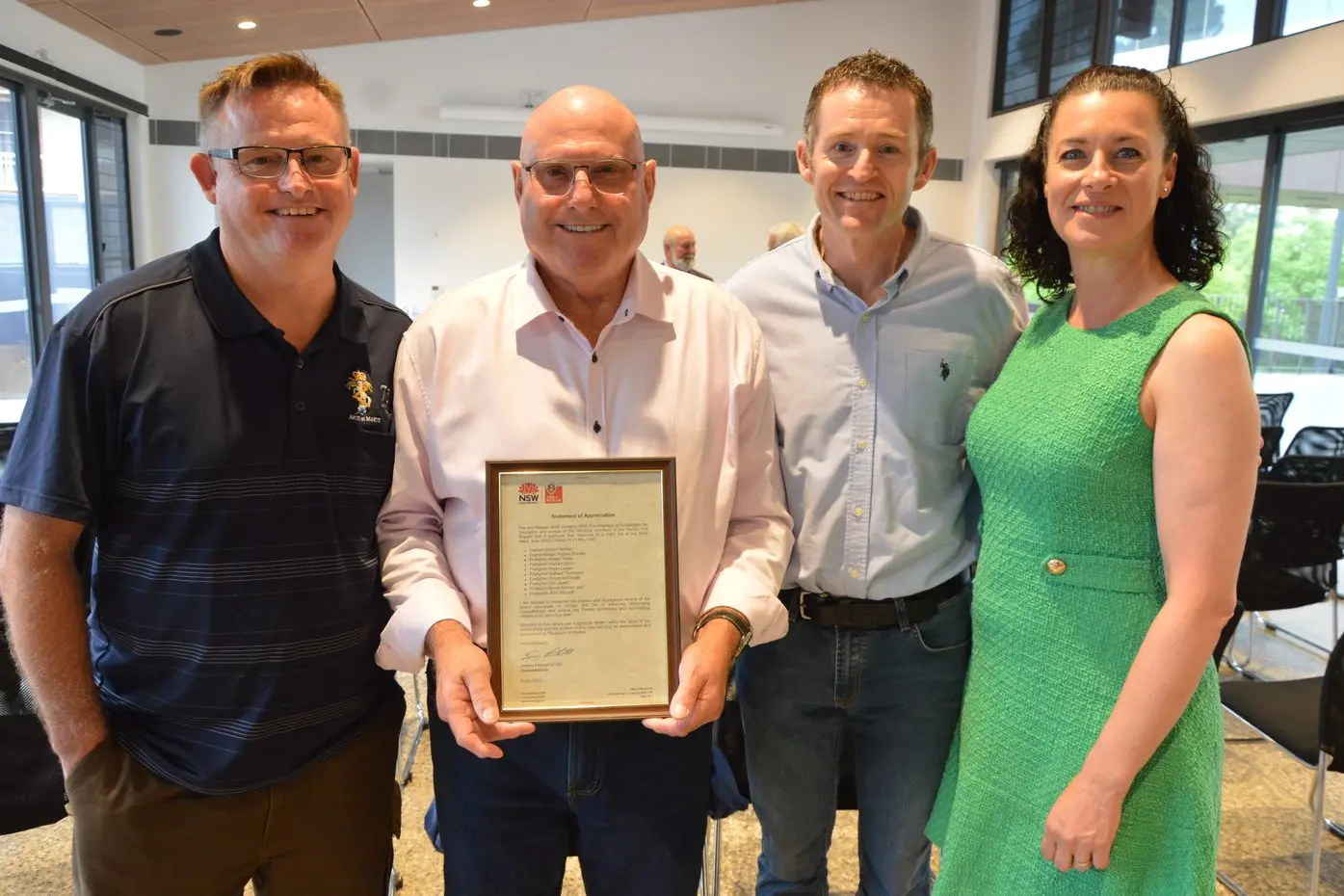 Son Phil Thompson from Maitland, firefighter Graham Thompson, son Tim Thompson and his wife Melissa Thompson, both from Bathurst. PHOTOS: Christine Little