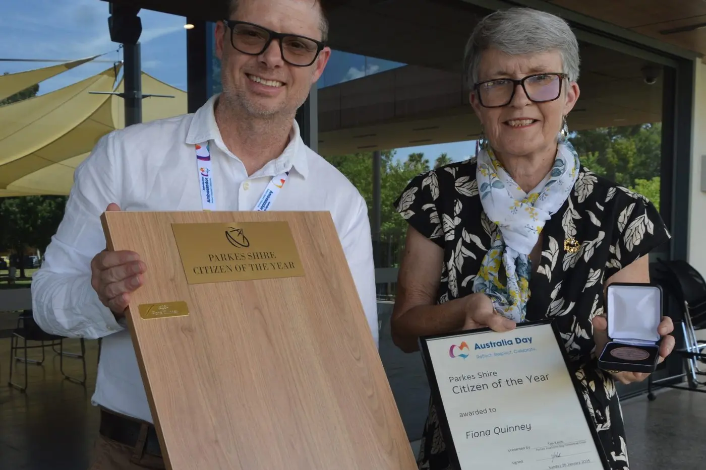 Australia Day ambassador Tasman Cassim presented Fiona Quinney with the 2025 Parkes Citizen of the Year. PHOTOS: Christine Little