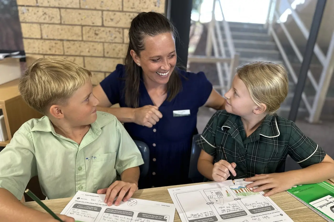 Seth Austin, Mrs Barton and Hannah Farrell. PHOTOS: Supplied