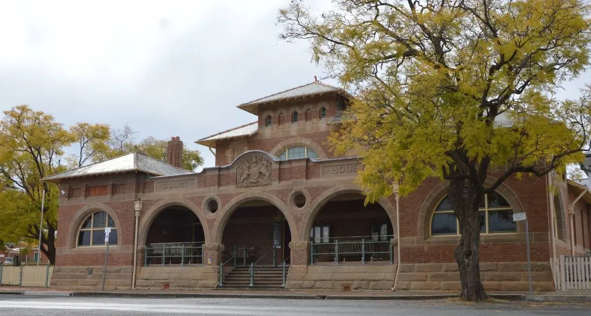 Man allegedly intimidates two others with rifle