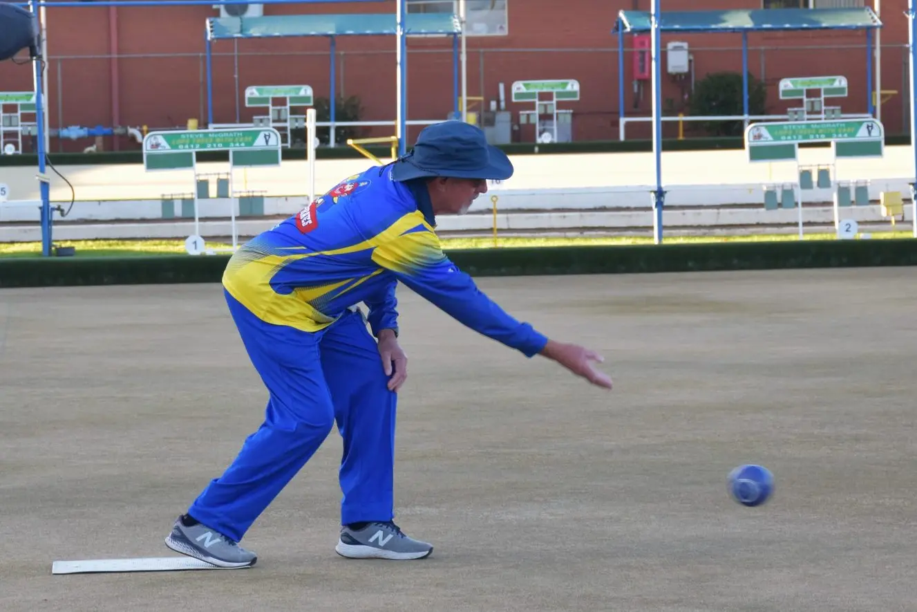 Noel Johnstone sends a bowl down the green. Photo by Jenny Kingham
