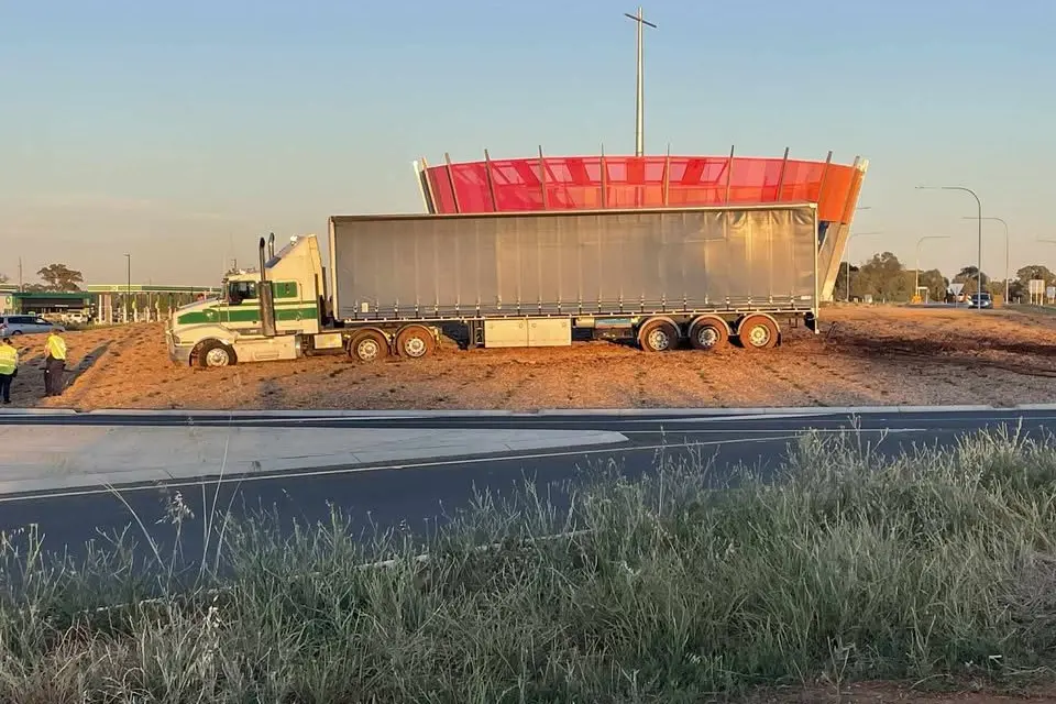 The 67-year-old driver of a semi trailer faces six charges after ploughing through the new Parkes Bypass roundabout early Thursday morning. PHOTO: Scott Winter