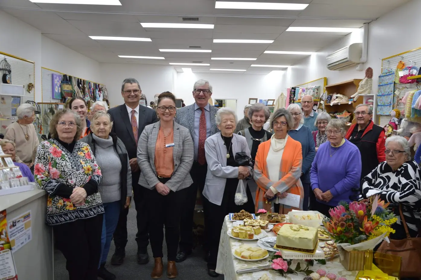 Craft Corner members past and present with Parkes Mayor Neil Westcott, Councillors Marg Applebee and Bill Jayet and Northparkes Mines representative Chloe Allan.