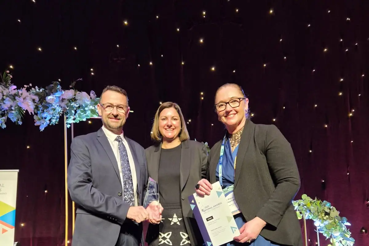 Council\\u2019s Fleet and Depot Manager Michael O\\u2019Shannessy and Parkes Shire Deputy Mayor Marg Applebee accepting Parkes Shire Council\\'s award from Federal Minister for Regional Development and Local Government, Kristy McBain MP. PHOTO: Supplied