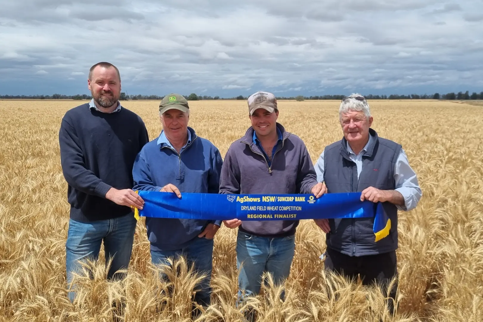 <p>Peter Berryman from Suncorp Bank, Nigel and Lachlan Porter (growers) and Frank McRae (judge). PHOTOS: AgShows NSW</p>\\n