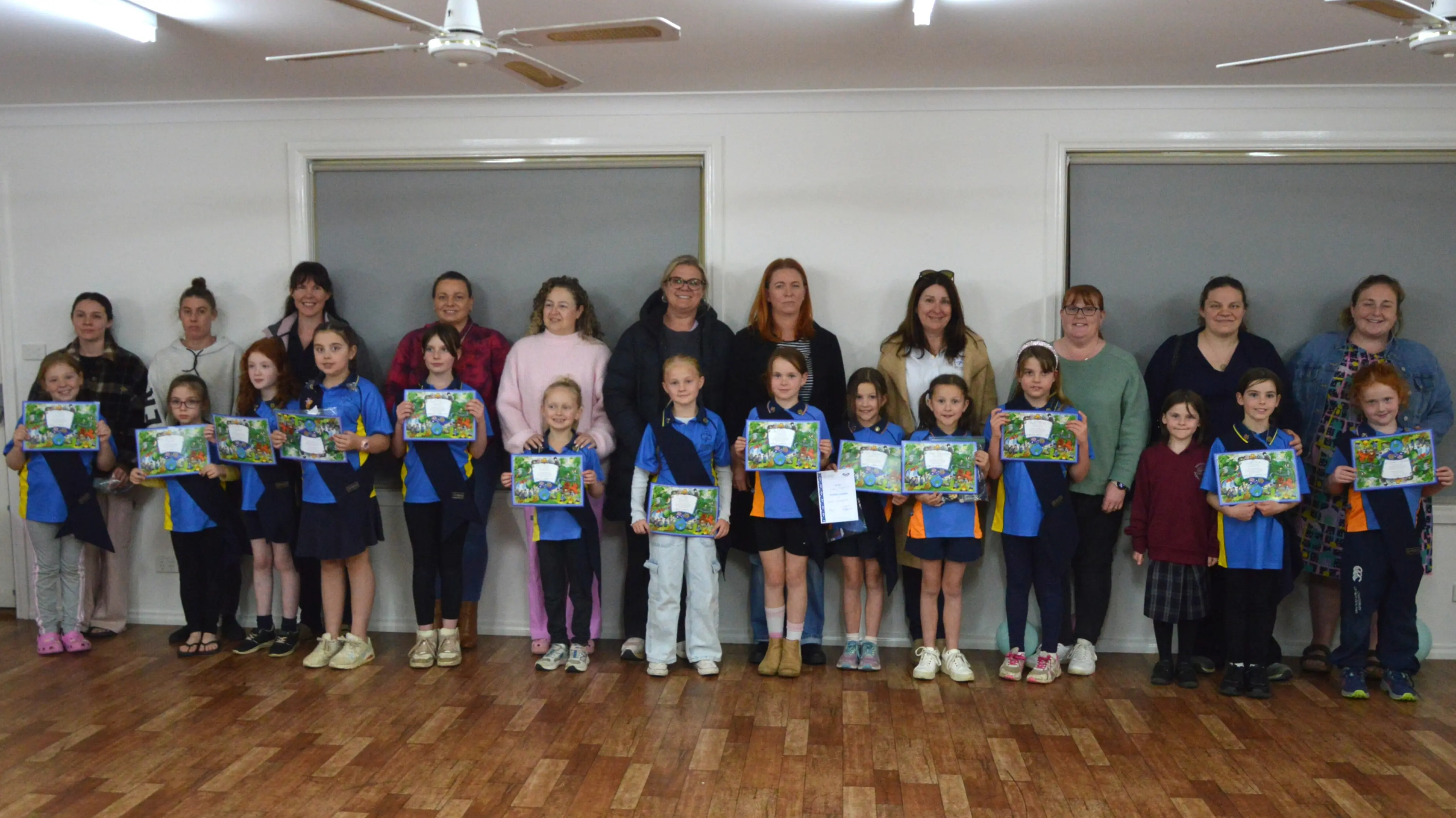 Girl Guides honoured with badges and sashes