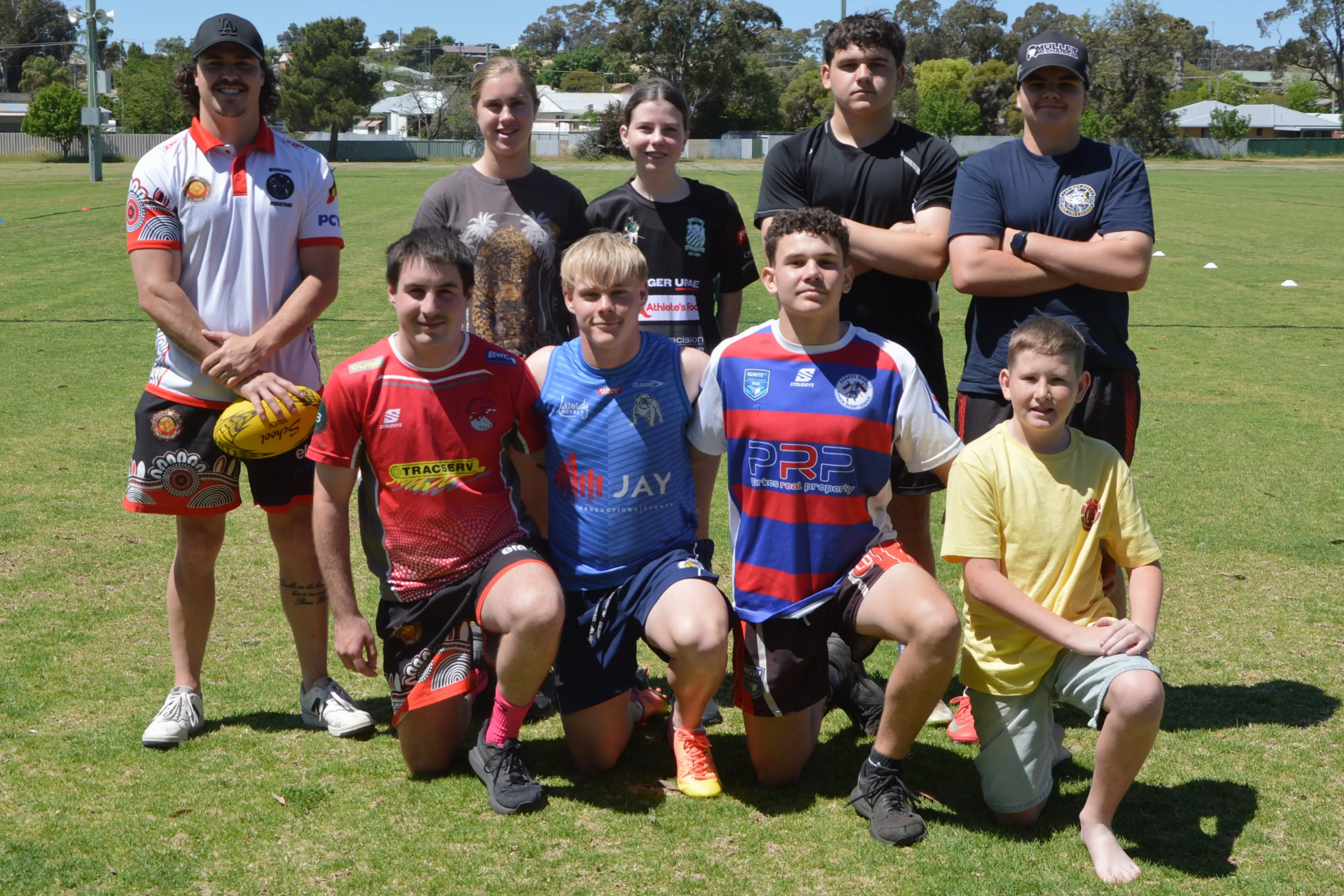 <p>Torin Hando from Parkes PCYC with the group of teens at Cheney Oval playing speed league. Back: Torin Hando, Hayley Lawrence, Jorja Hetherington, Lucus Edwards, Billy Simpson; front: Hayden Hodge, Memphis Jones, Max MacGregor and Toby Duff. PHOTO: Madeline Blackstock </p>\\n