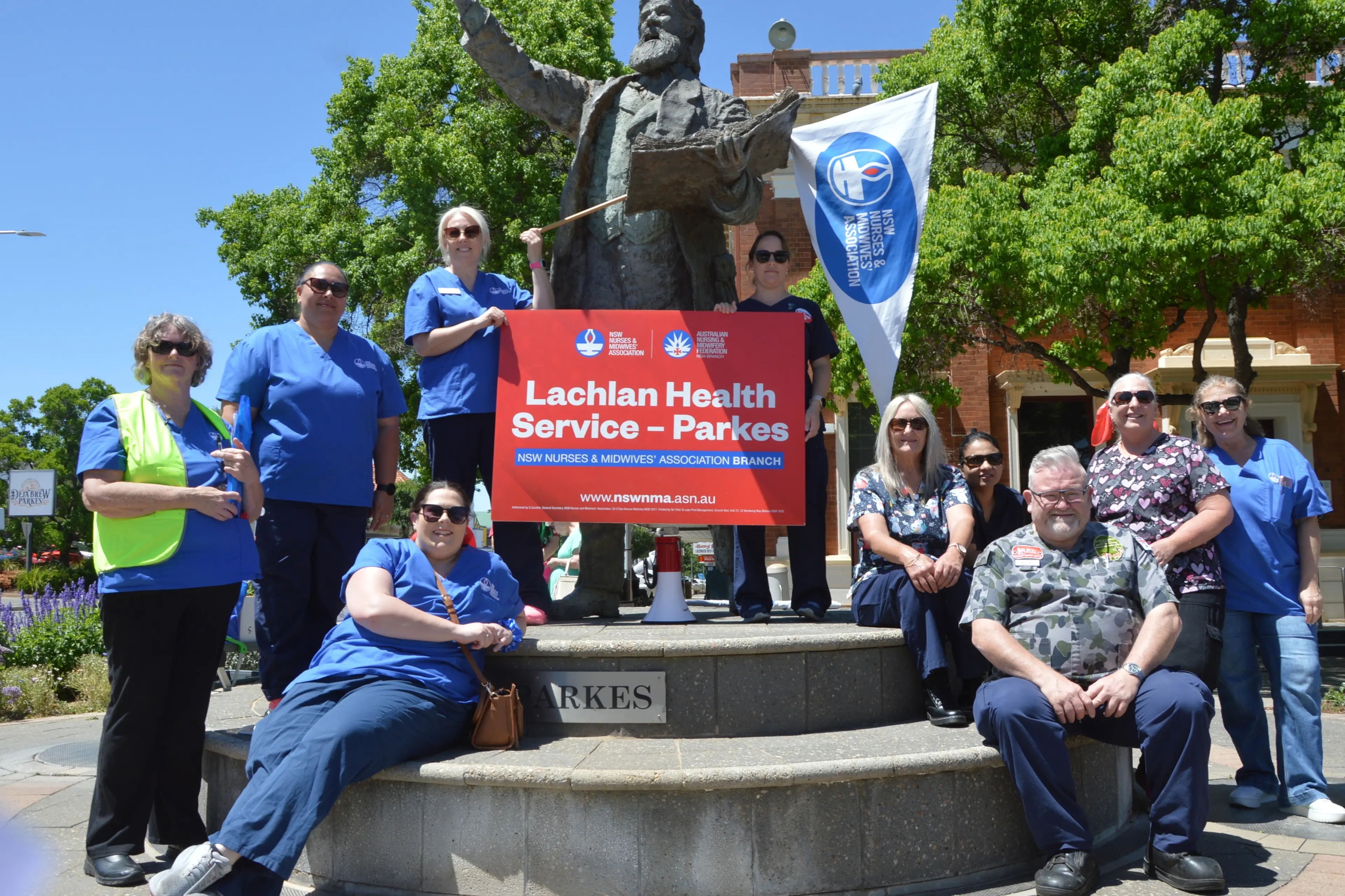 <p>Members of the Lachlan Health Service Parkes Branch NSW Nurses and Midwives Association are calling for the support of Parkes, demanding the government to invest in the Parkes Hospital to ensure it is safe for both staff and patients. PHOTO: Madeline Blackstock</p>\\n