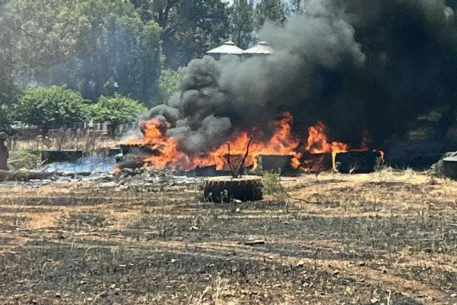 <p>A grassfire burned more than 10 hectares on Cookamidgera Road last Friday, igniting timber and machinery on the property too. PHOTO: NSW RFS Parkes Headquarters Brigade</p>\\n