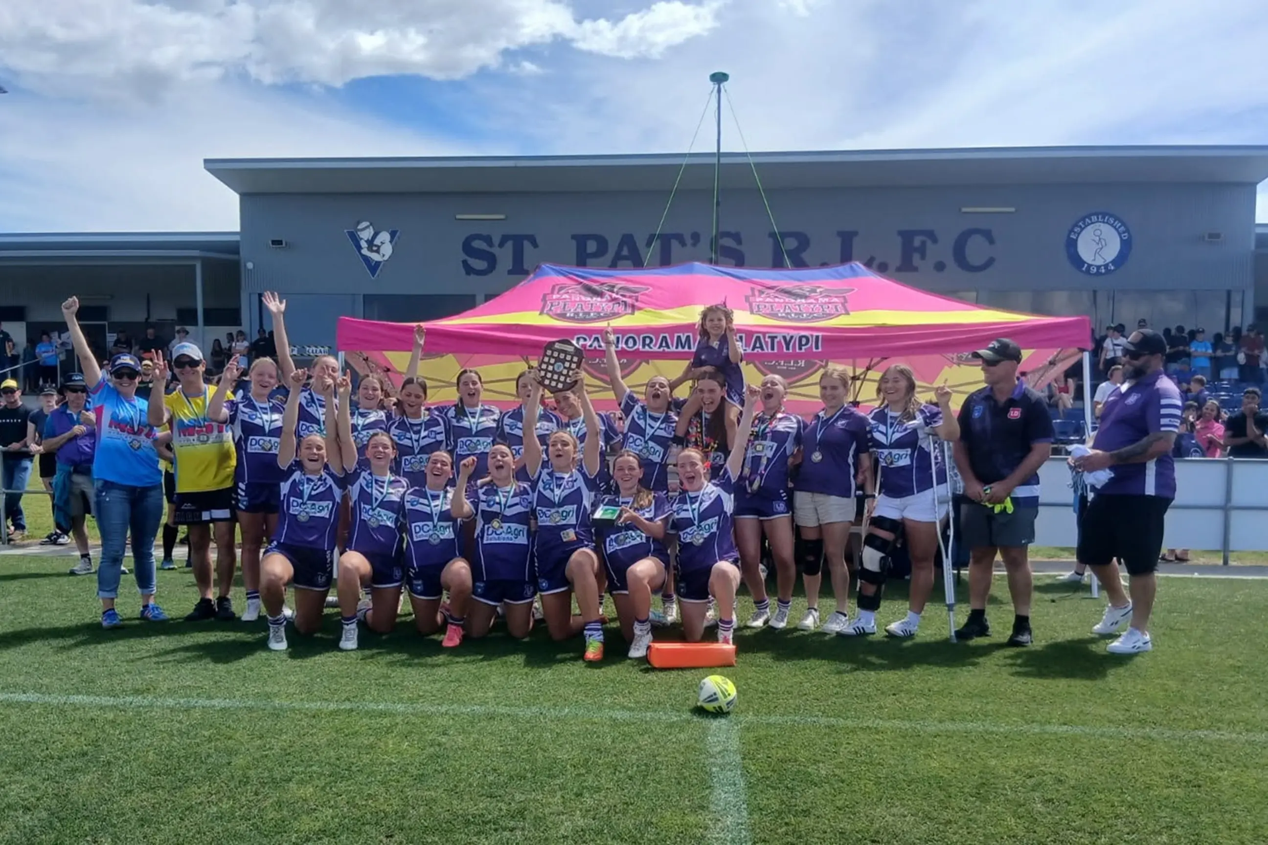 <p>Premiership-winning Lachlan Under 16s and coach Troy Gosper celebrate their Western Women\\'s Rugby League grand final victory. PHOTO: Lachlan JRL</p>\\n