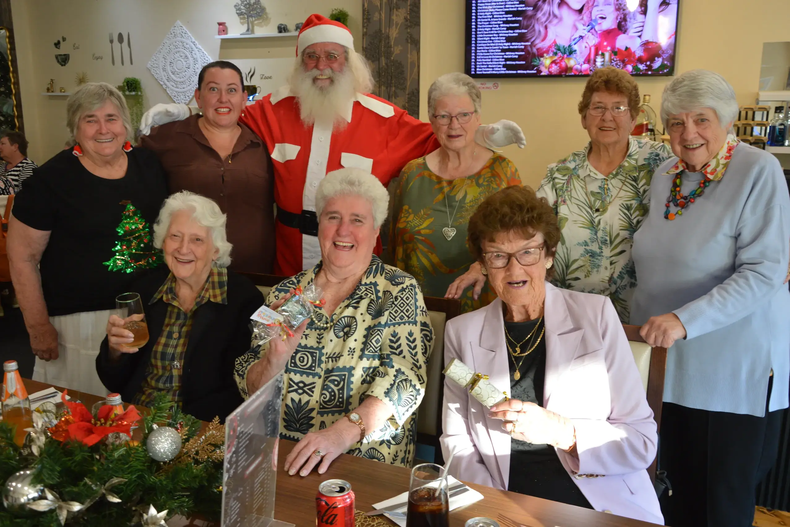 <p>Full of festive cheer were, back, Bev Ellis, Lyretta Gilby, Santa (Kevin Dumesny), Pat Bailey, Rhonda Slade and Anne McLachlan; front, Pam Moule, Helen Pearce and Jean Foran.</p>\\n