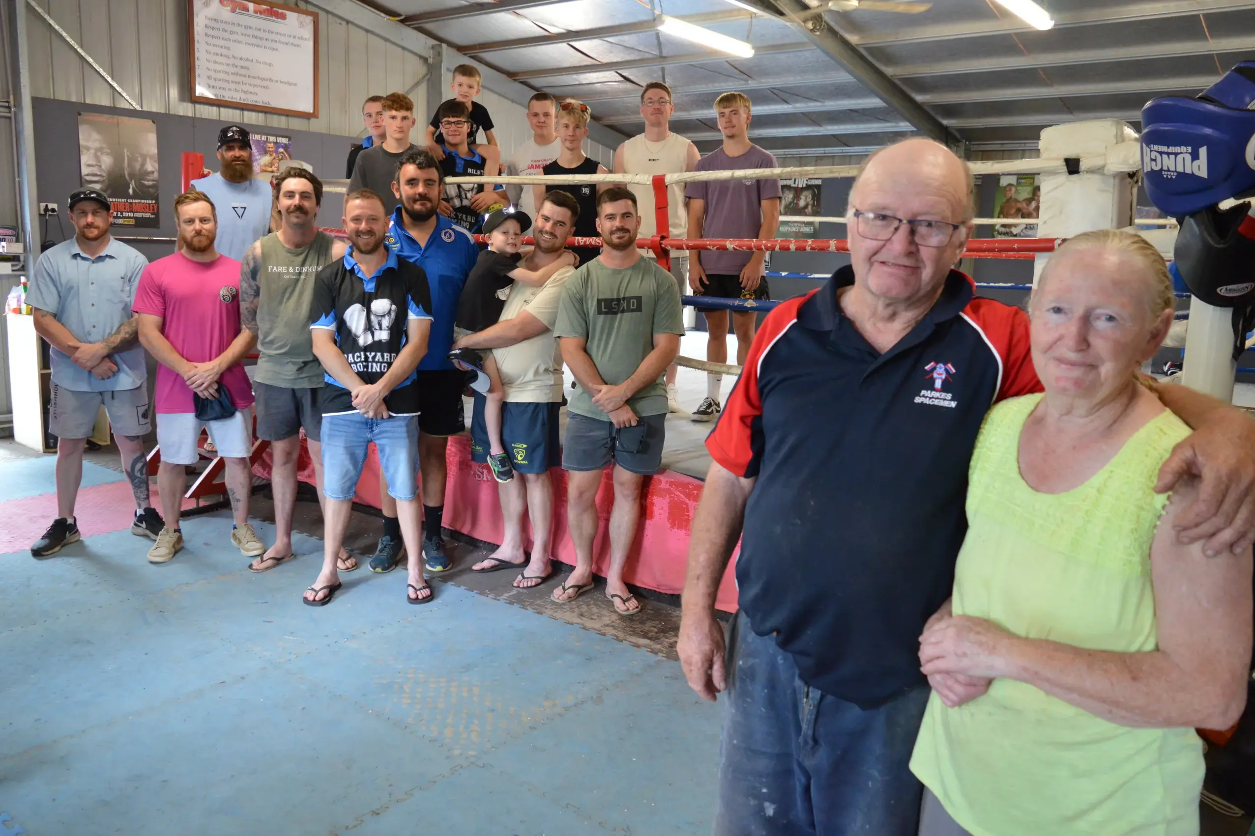 <p>Tommy and Jenny Ward with their Backyard Boxing family - Tommy will retire from training Parkes\\' boxing youth after almost 40 years. PHOTO: Christine Little</p>\\n