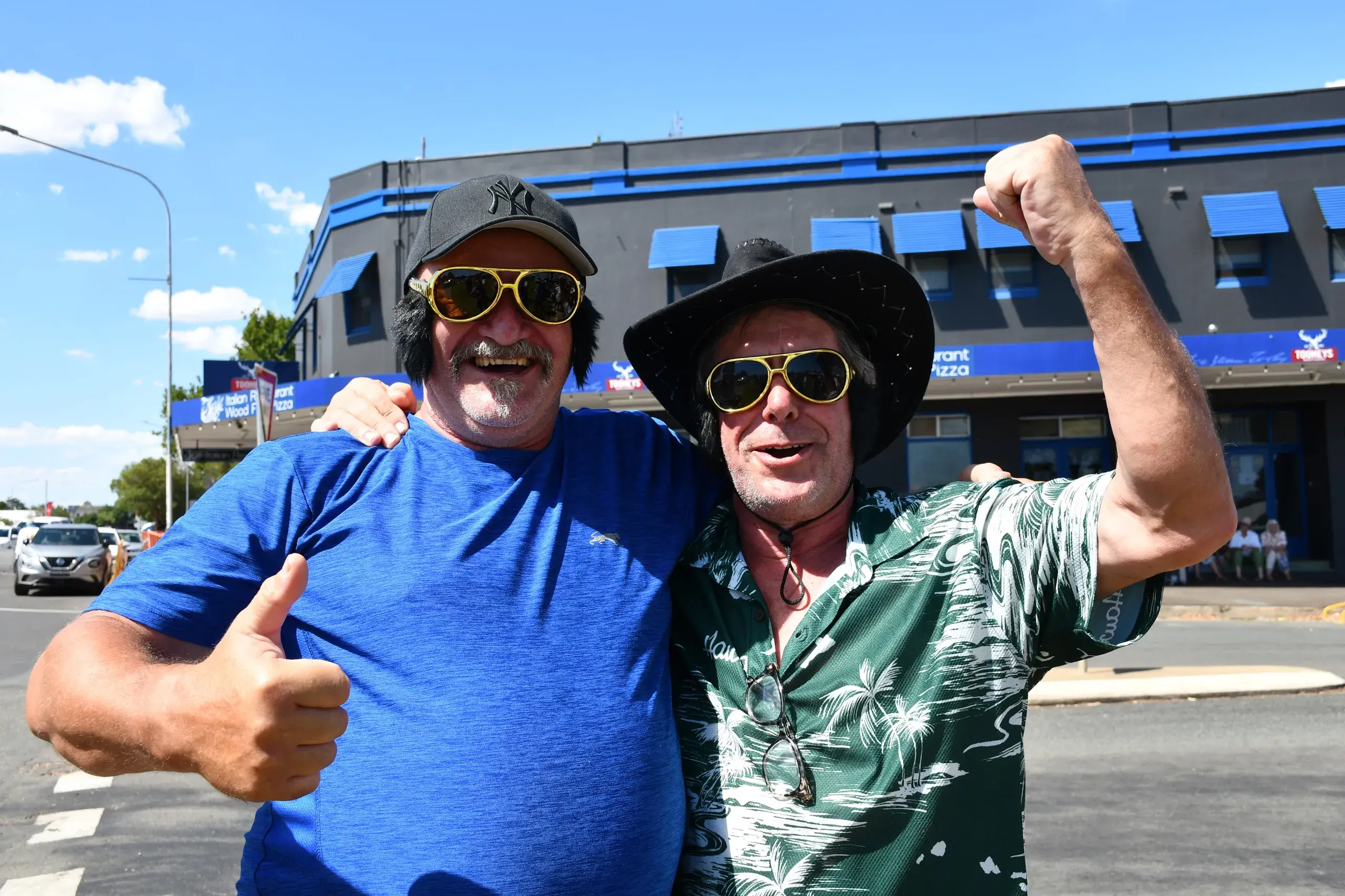 <p>Some excited festival goers not long after the Elvis Express arrived in town on Wednesday afternoon. PHOTO: Jenny Kingham</p>\\n
