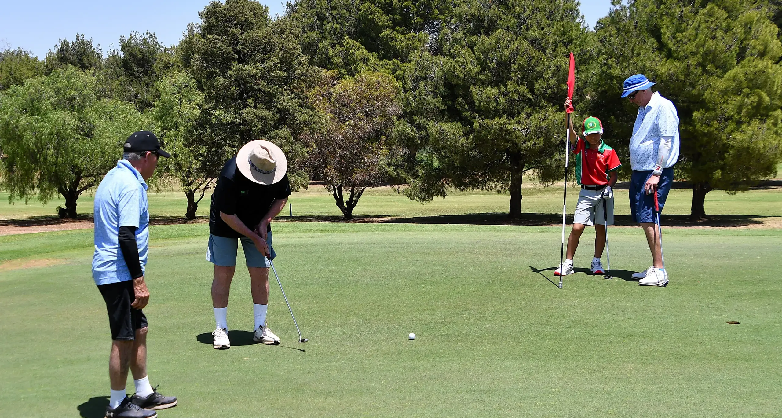 Strong winds challenge golfers, duo emerge winners