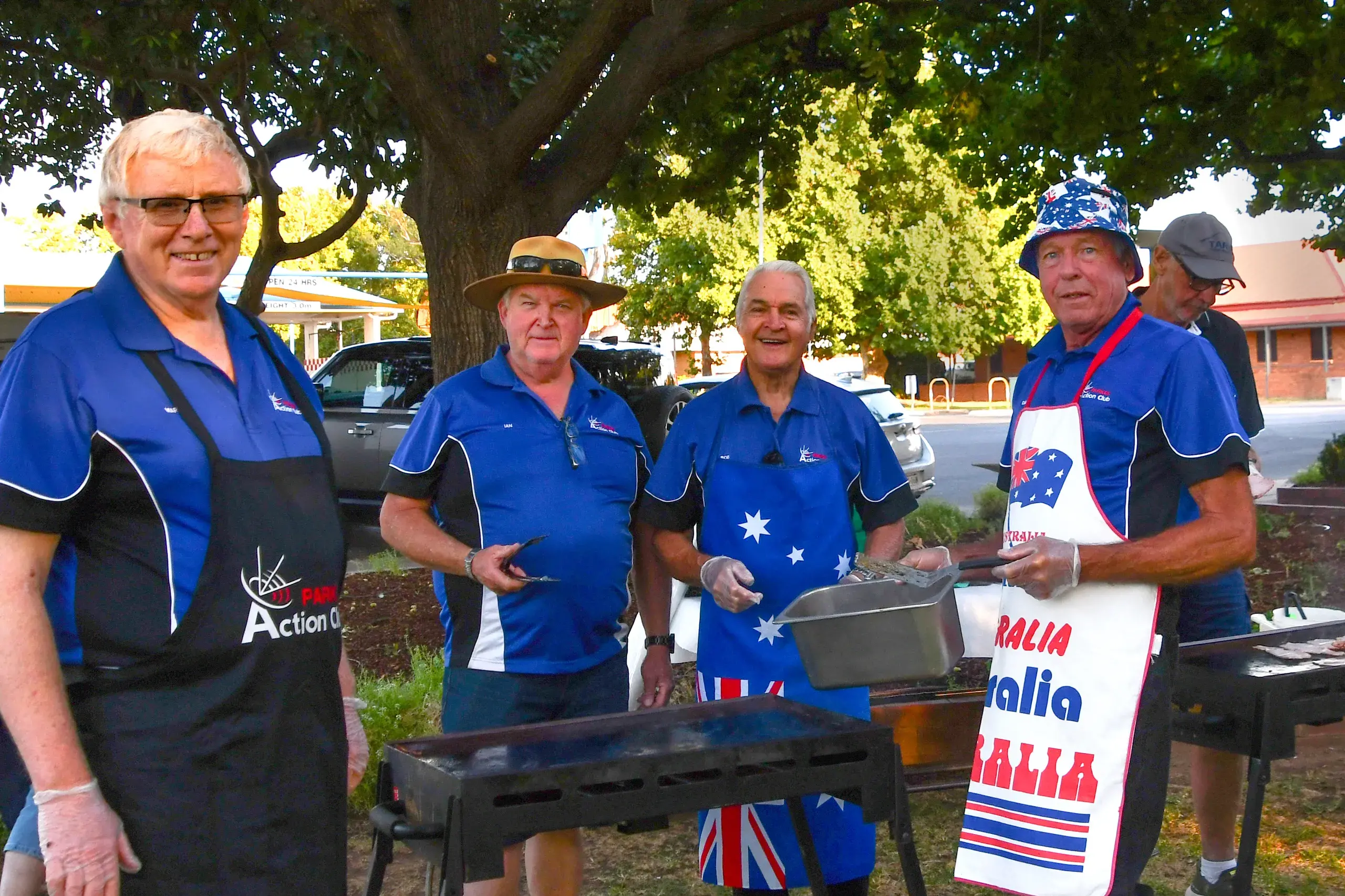 <p>Every year Parkes Action Club members cook and serve a free Australia Day breakfast in Cooke Park. PHOTO: Jenny Kingham</p>\\n