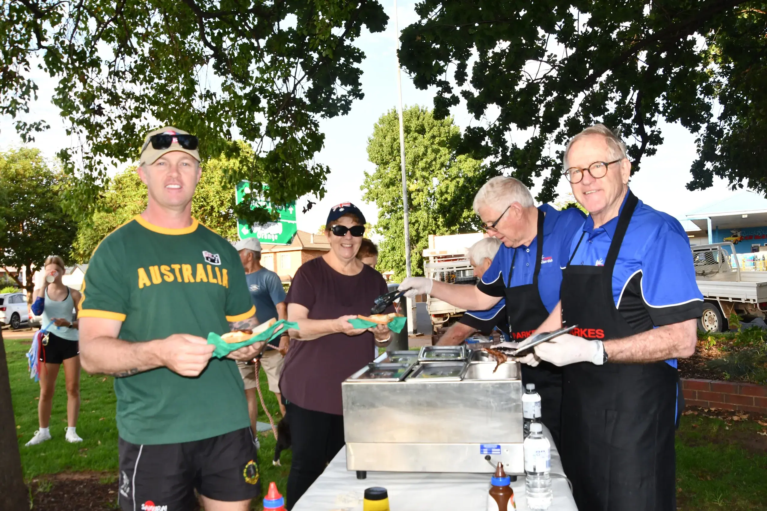 <p>Mark Olsen and Garry Somers from the Parkes Action Club served breakfast to happy walkers in the park on Australia Day. PHOTOS: Jenny Kingham</p>\\n