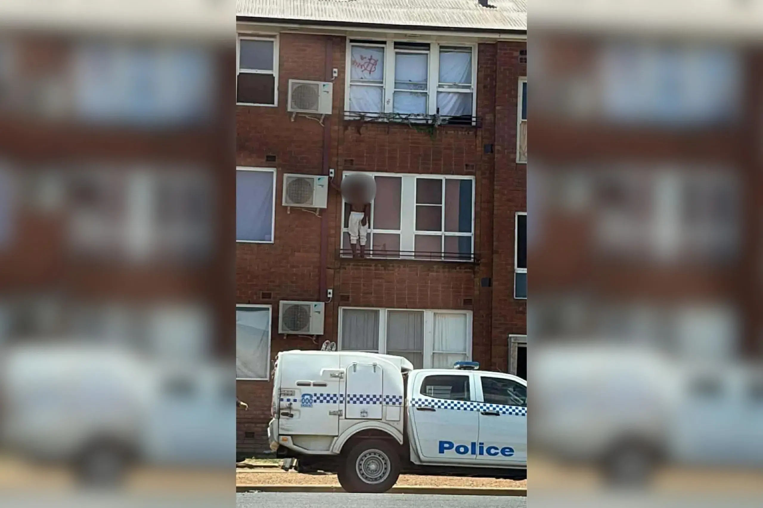 <p>A man climbed the Grenfell Street flats to evade police on Sunday afternoon, bringing the area to a standstill for seven hours. PHOTO: Supplied</p>\\n