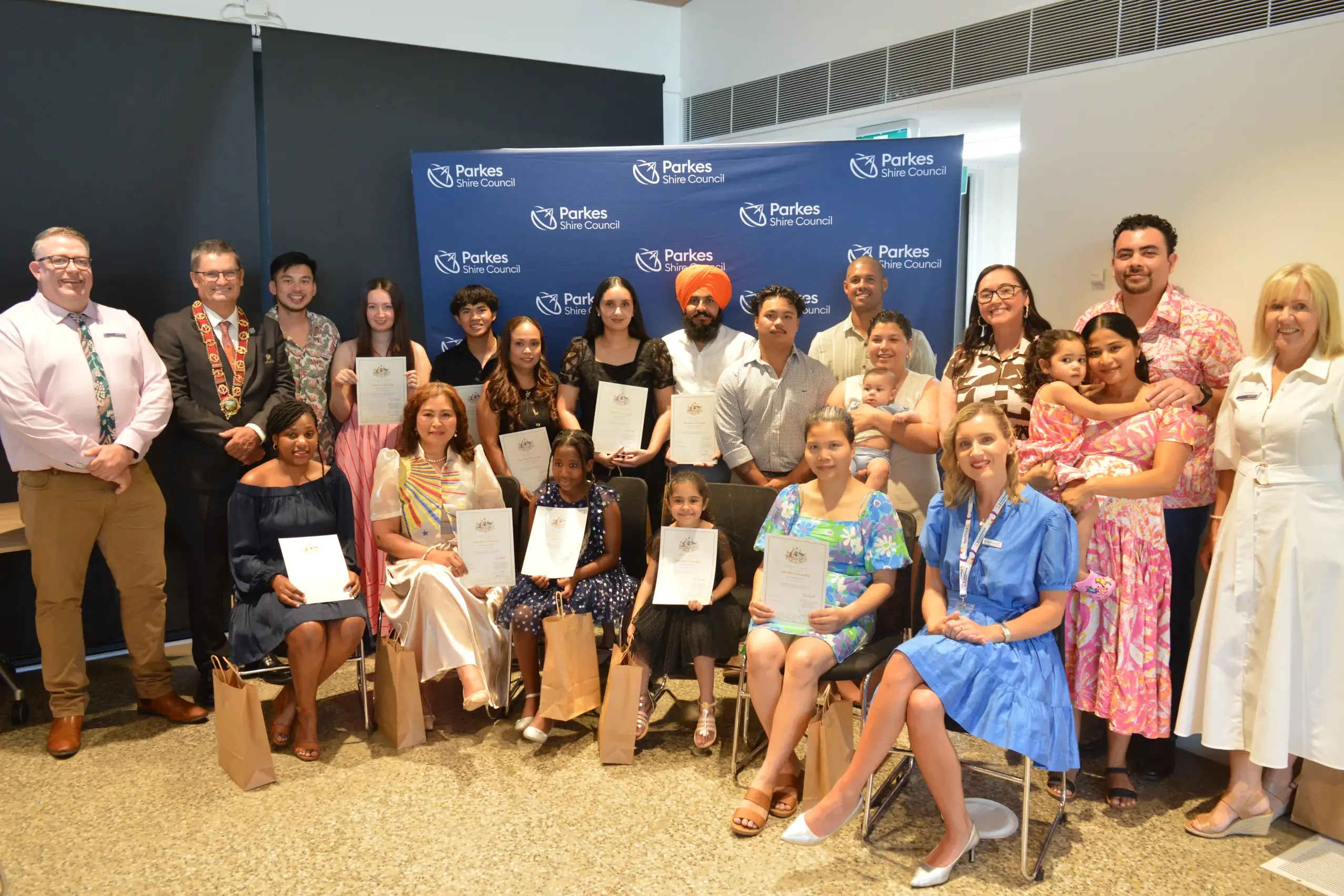 <p>A record 17 people became Australian citizens at the Cooke Park Pavilion on the eve of Australia Day on Sunday. PHOTOS: Christine Little</p>\\n