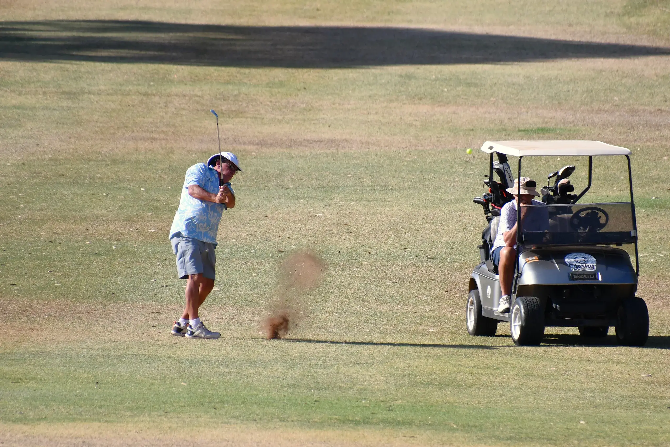 <p>Mick Smith hits the ball up the fairway on the Parkes Golf Course which has been drying out due to the recent oppressive conditions. PHOTO: Jenny kingham</p>\\n