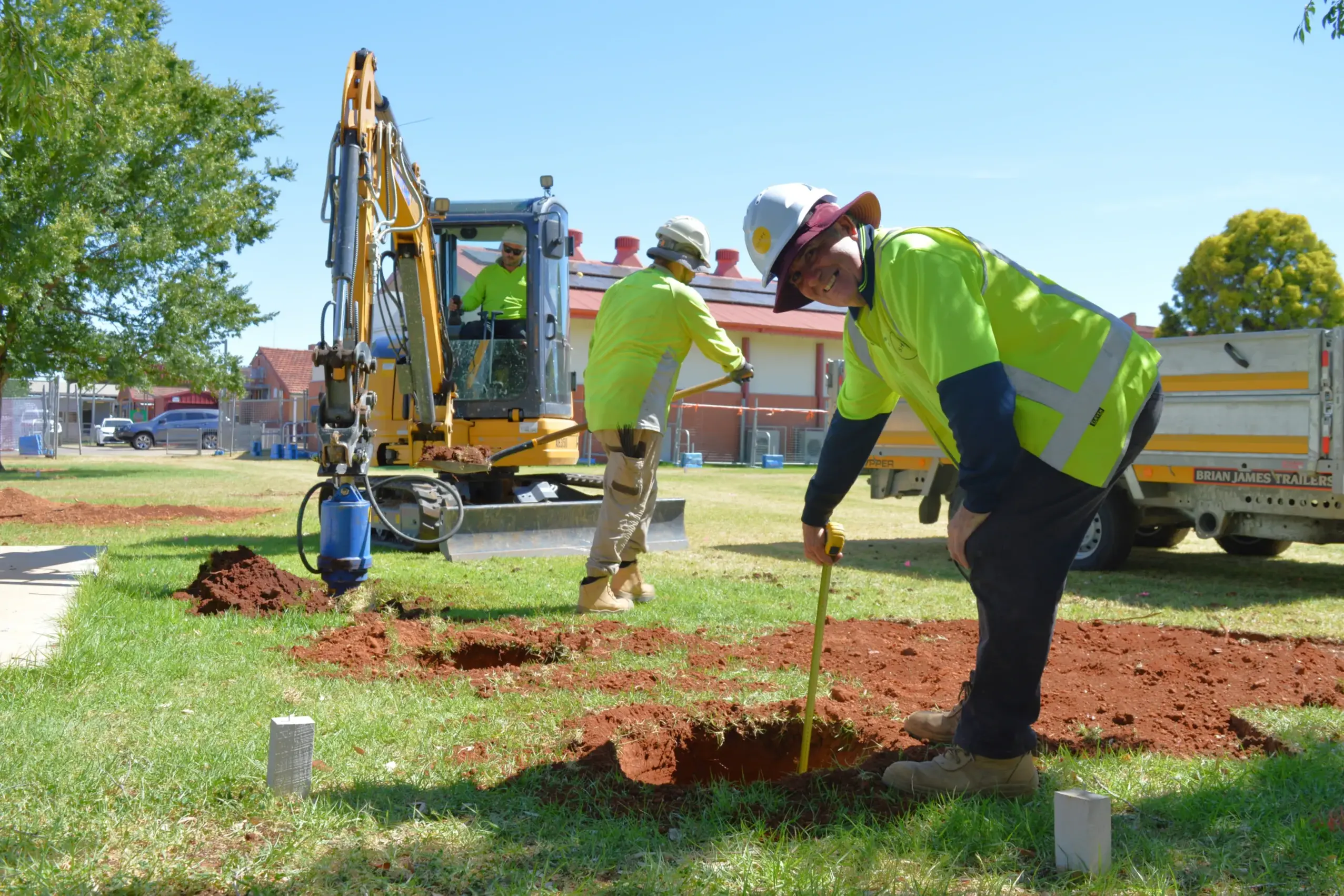 <p>Site manager for the construction of the new preschool at Parkes East Public School, Derek Faulknall, with his team from SHAPE Australia breaking ground on Monday ahead of the build. PHOTOS: Christine Little</p>\\n