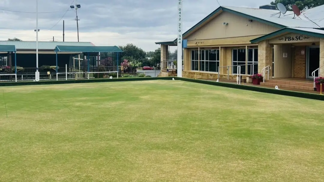 Three generations take on the bowling green