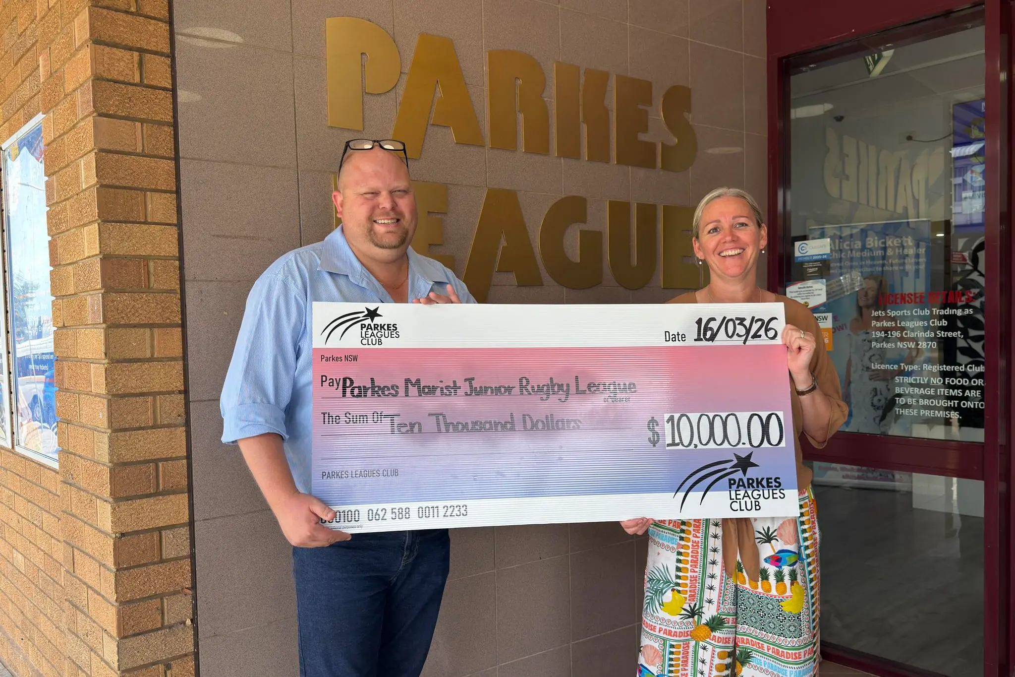 <p>Michelle Finnegan accepted the generous donation from Parkes Leagues Club manager Henry Stockman-Ellis on behalf of the Parkes Marist Junior Rugby League Club. PHOTO: Parkes Leagues Club</p>\\n