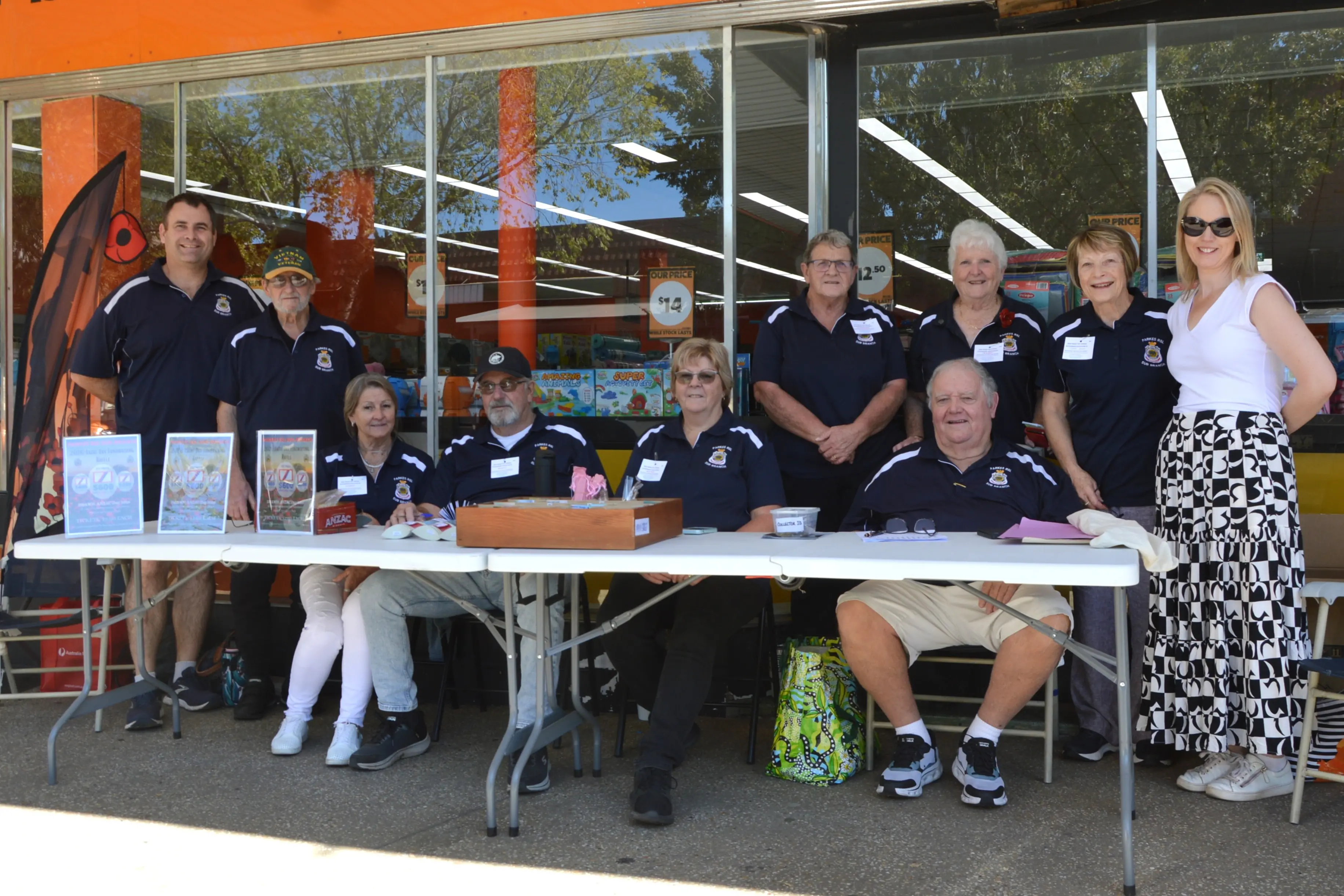 <p>Parkes RSL Sub Branch members selling ANZAC Day raffle tickets - Brendan Orr, president Keith Woodlands, Sue and Ian Griffey, Mickey Roffe, Raylene Knights, Lyn Kennedy, Paul Thomas (front), Fran Dixon with Parkes High School SRC coordinator Bec James. PHOTOS: Madeline Blackstock</p>\\n