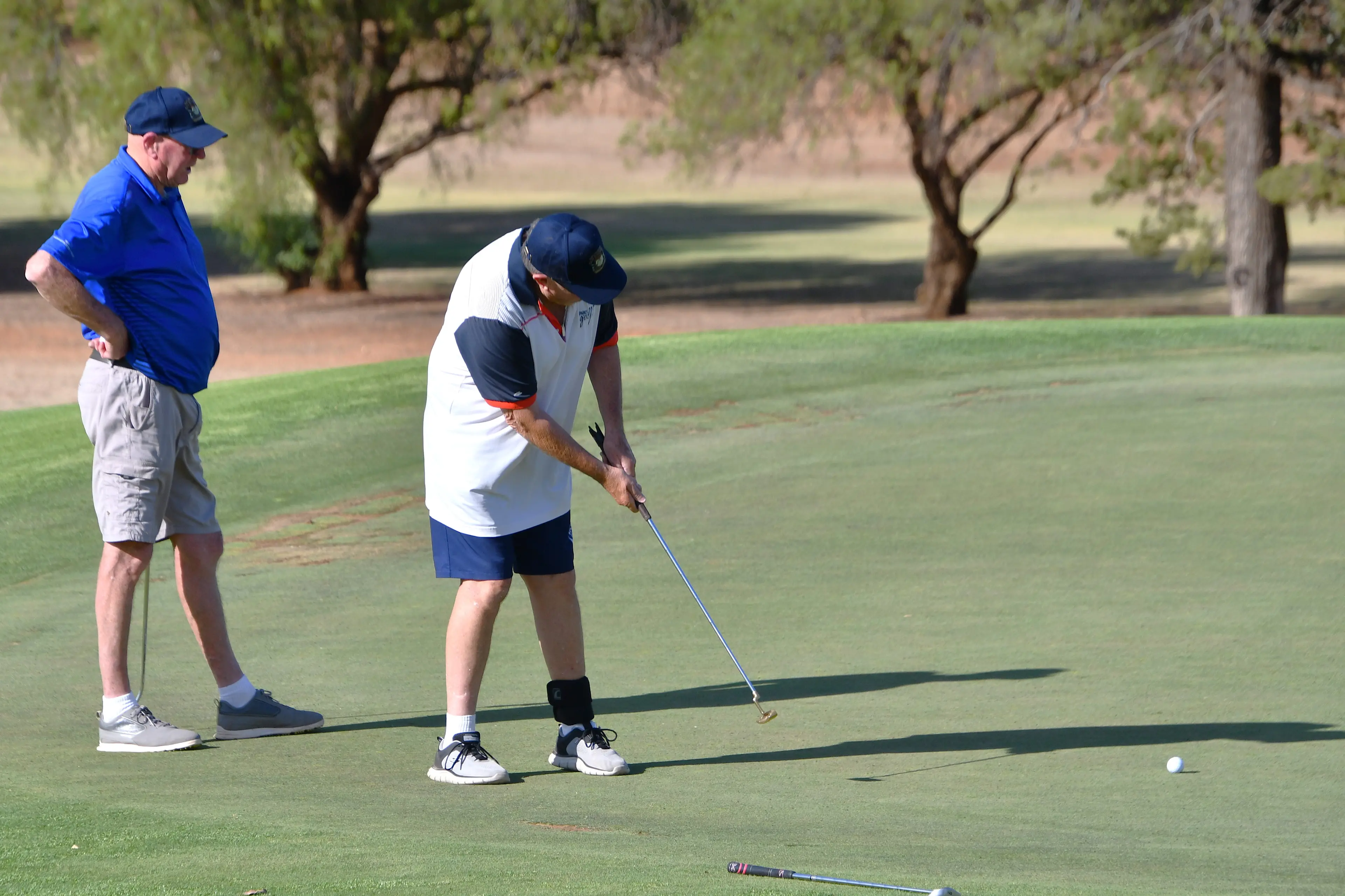 <p>Wally Norman has been spotted having a hit at Parkes Golf Club, with Peter Boschman. PHOTO: Jenny Kingham</p>\\n