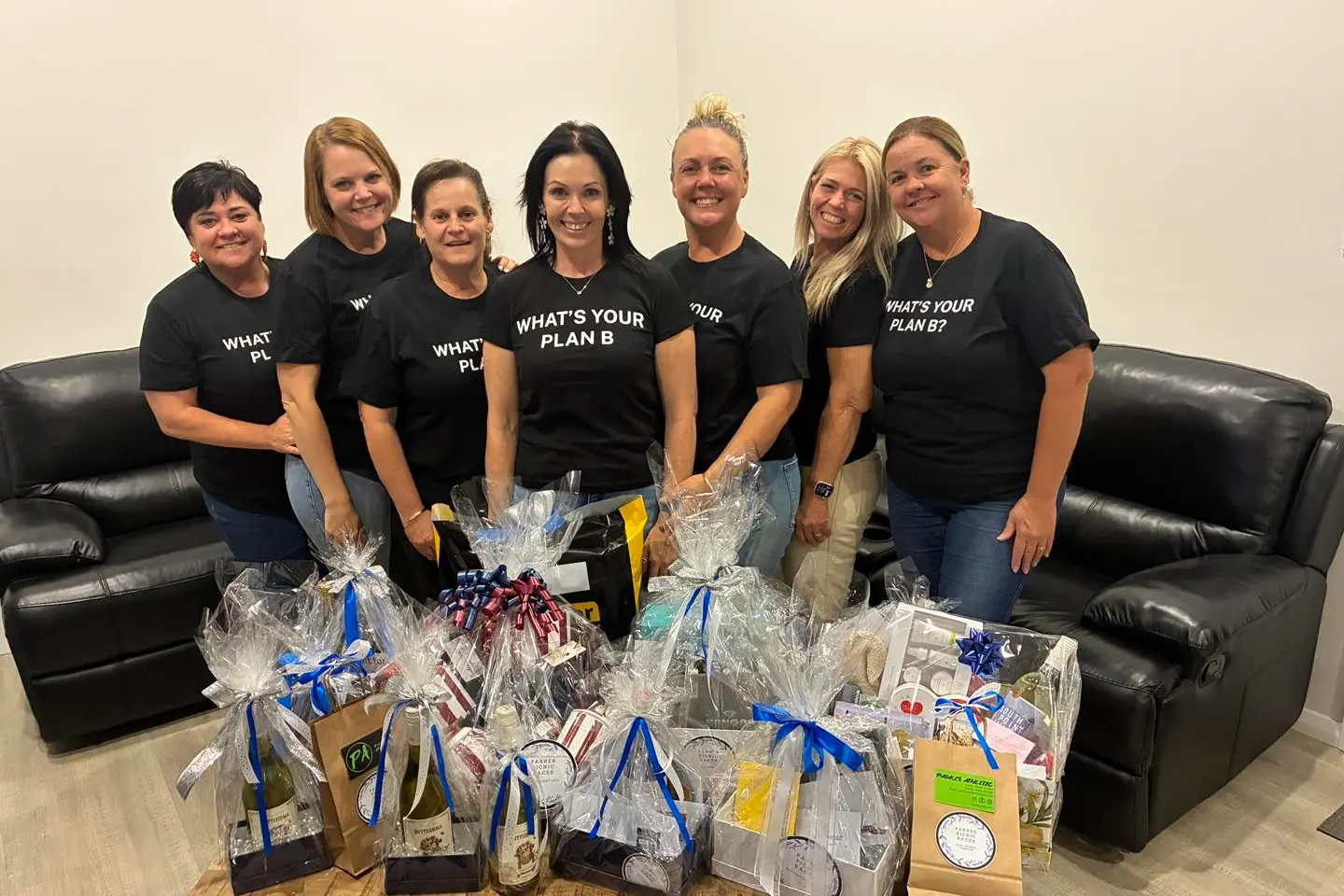<p>Some of the Parkes Picnic Races committee working hard on a Sunday prepping Fashions on the Field prizes - Kelly Spedding, Ellie O\\u2019Donoghue, Leanne Wright, Fiona Glasheen, Sommer Bishop, Kathryn Blackstock and Tricia Trim. PHOTO: Parkes Picnic Races Facebook</p>\\n