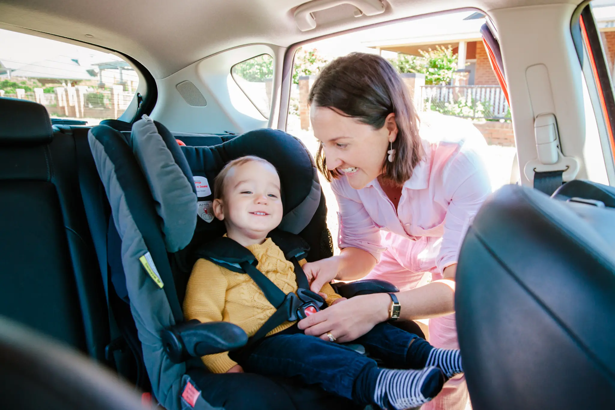 <p>Mum Natalie Williams makes sure little Harvey\\'s child restraint is safe and secure before a trip in the car.</p>\\n