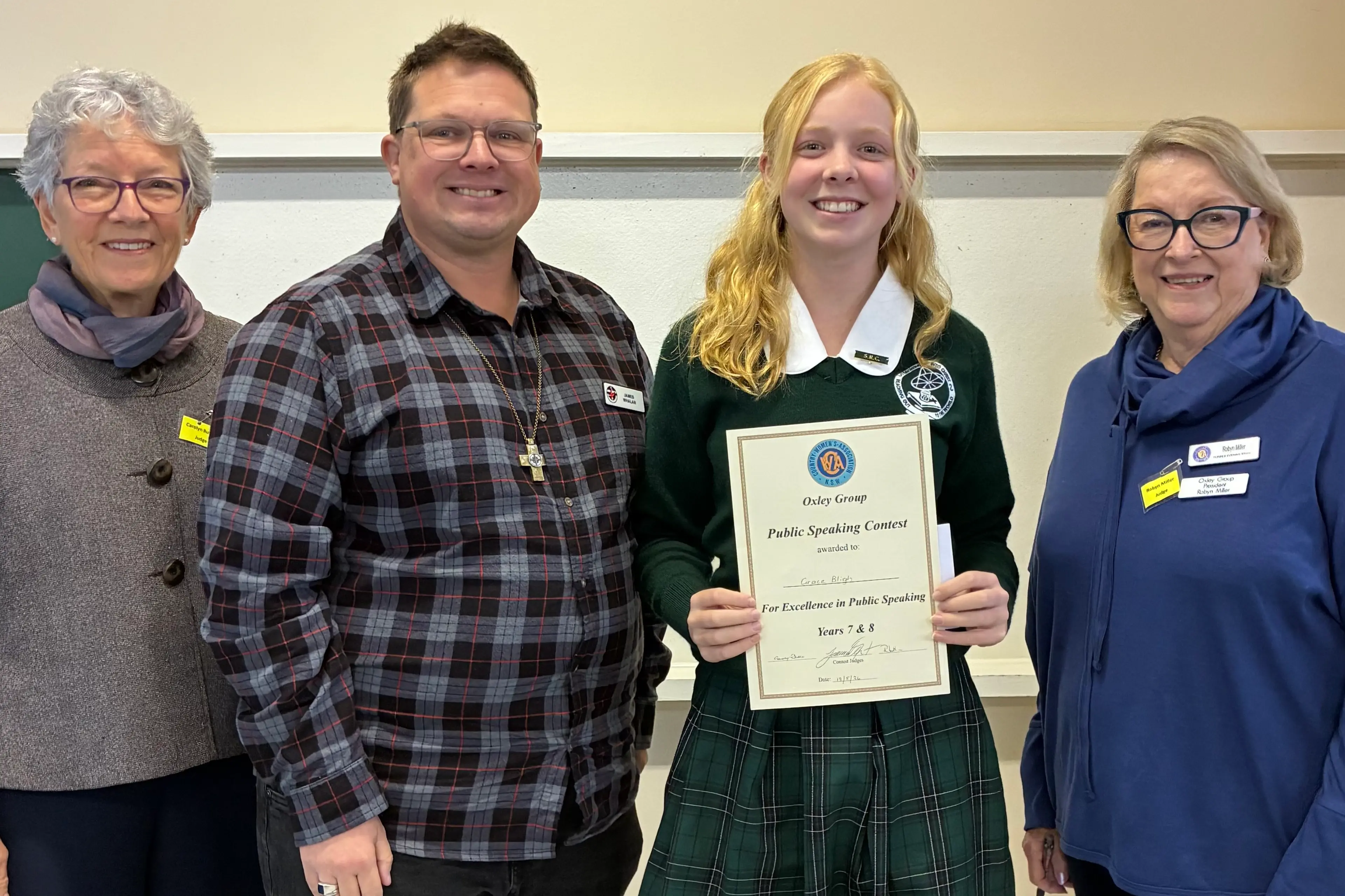 <p>Year 7/8 winner Grace Bligh (Parkes Christian School) with judges Carolyn Butler, James Whalan and Robyn Miller.</p>\\n