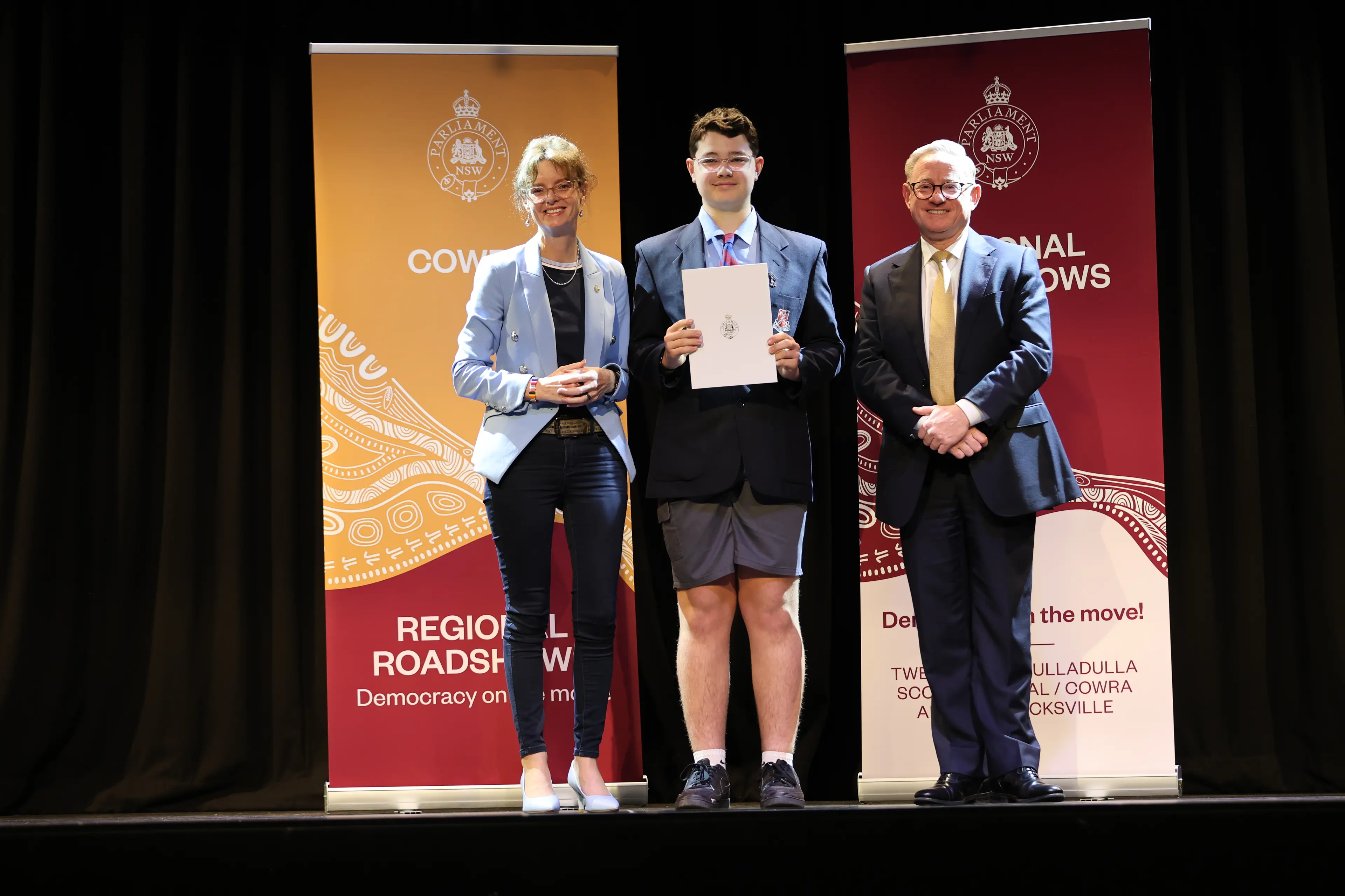 <p>Member for Cootamundra Steph Cooke and Ben Franklin MLC President of the Legislative Council with Rhys Hutchins from Parkes High School who was awarded joint runner-up in the regional roadshow public speaking competition.</p>\\n