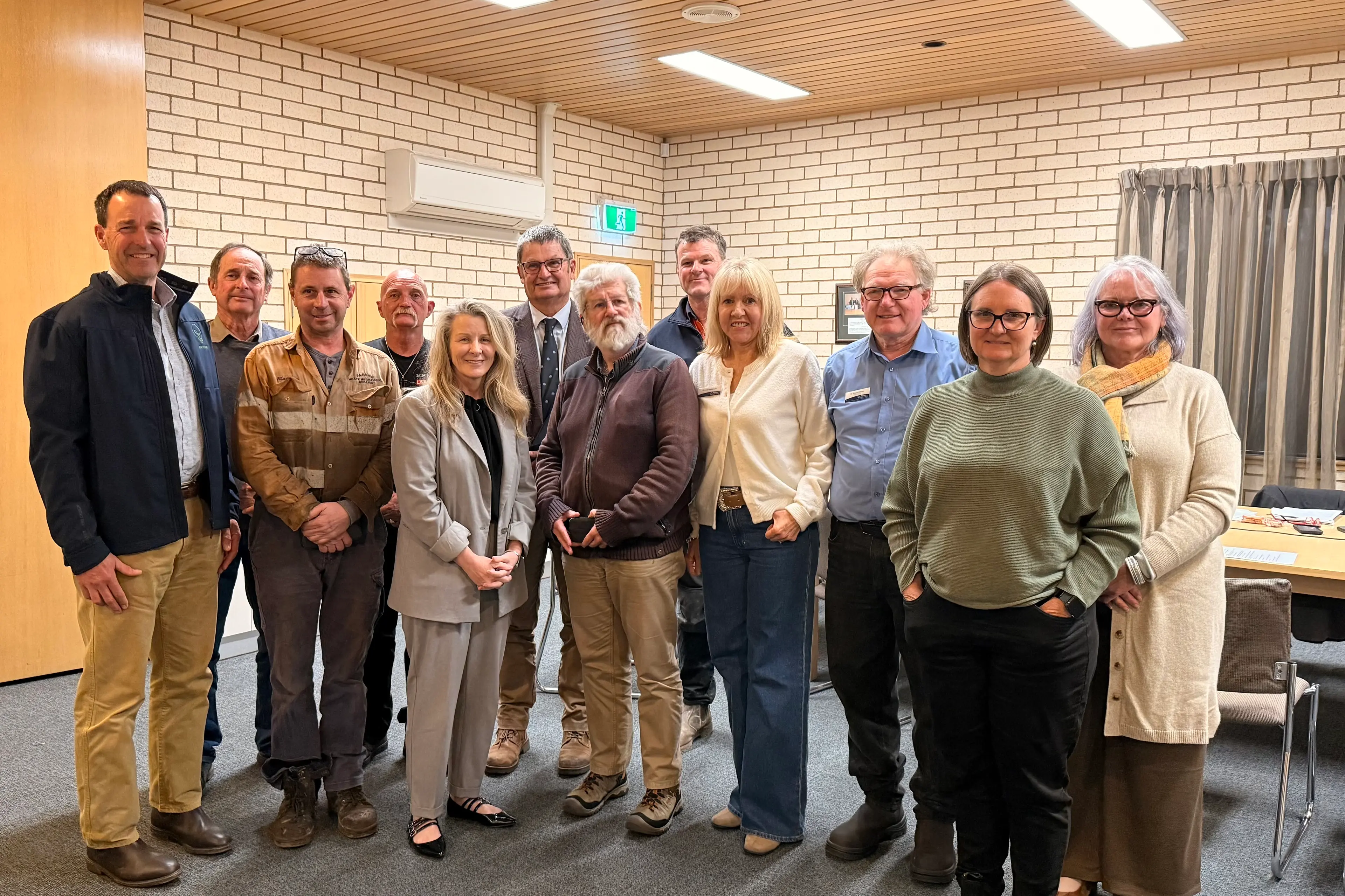 <p>Andrew Rice, Maurice Davey, Cr Matthew Scherer, Chris Williams, Tracie Robertson, Mayor Neil Westcott, Dr Peter Tait, Lachlan Bennie, Cr Joy Paddison, Cr Glenn Wilson, Sharon Woods and Caron Chester at the EfW Community Working Party introductory session with Dr Peter Tait in the Council Chambers on 15 July.</p>\\n