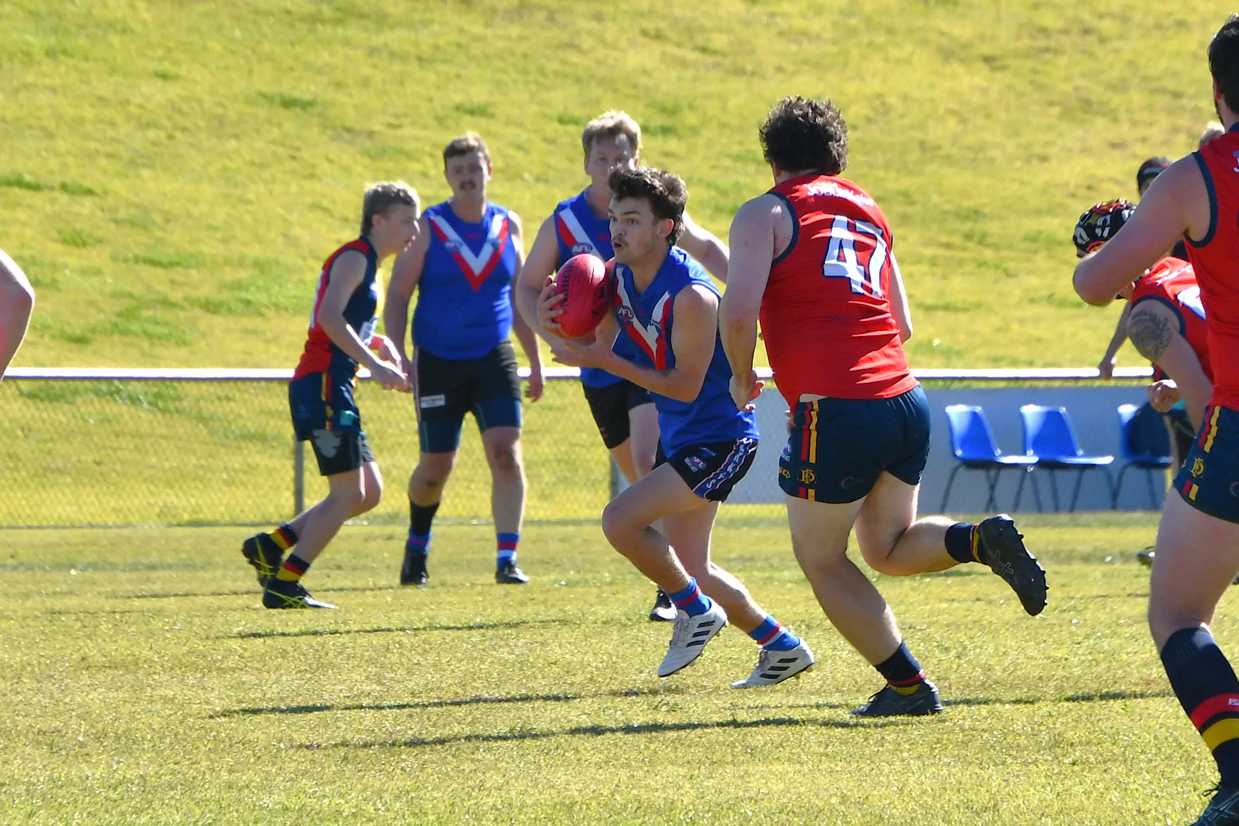 <p>Eli Parker attempting to evade a Dubbo Demon in their last game of the regular season at home on Northparkes Oval last Saturday. PHOTOS: Jenny Kingham</p>\\n