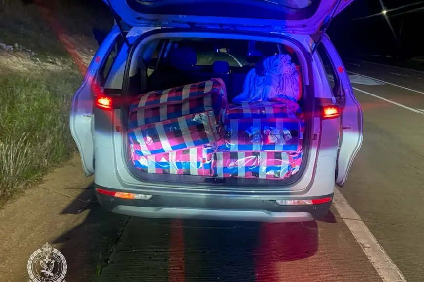 <p>Police allegedly found 155 individual bags of cannabis inside large plastic shopping bags, worth an estimated $850,000, during a vehicle stop on the Hume Highway near Yass.</p>\\n