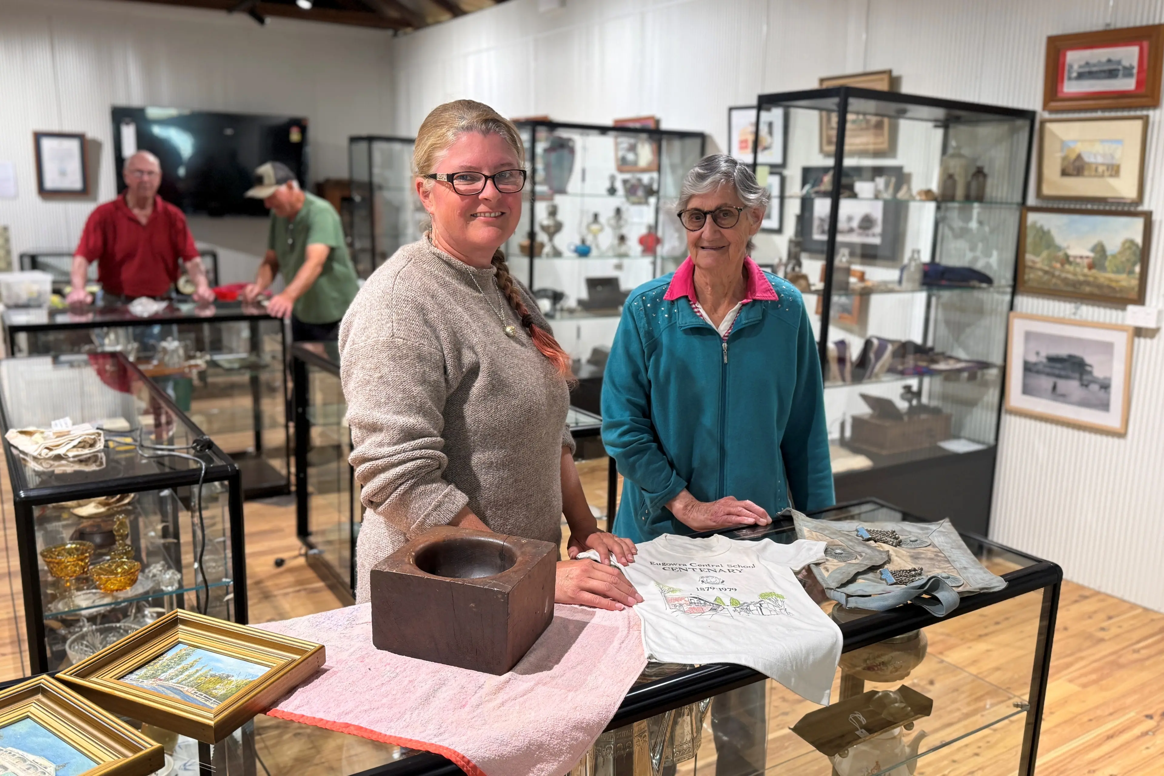 <p>Museum advisor Hayley Lavers and museum volunteer Daph Thompson giving items a final clean and finding them a place in the restored museum.</p>\\n